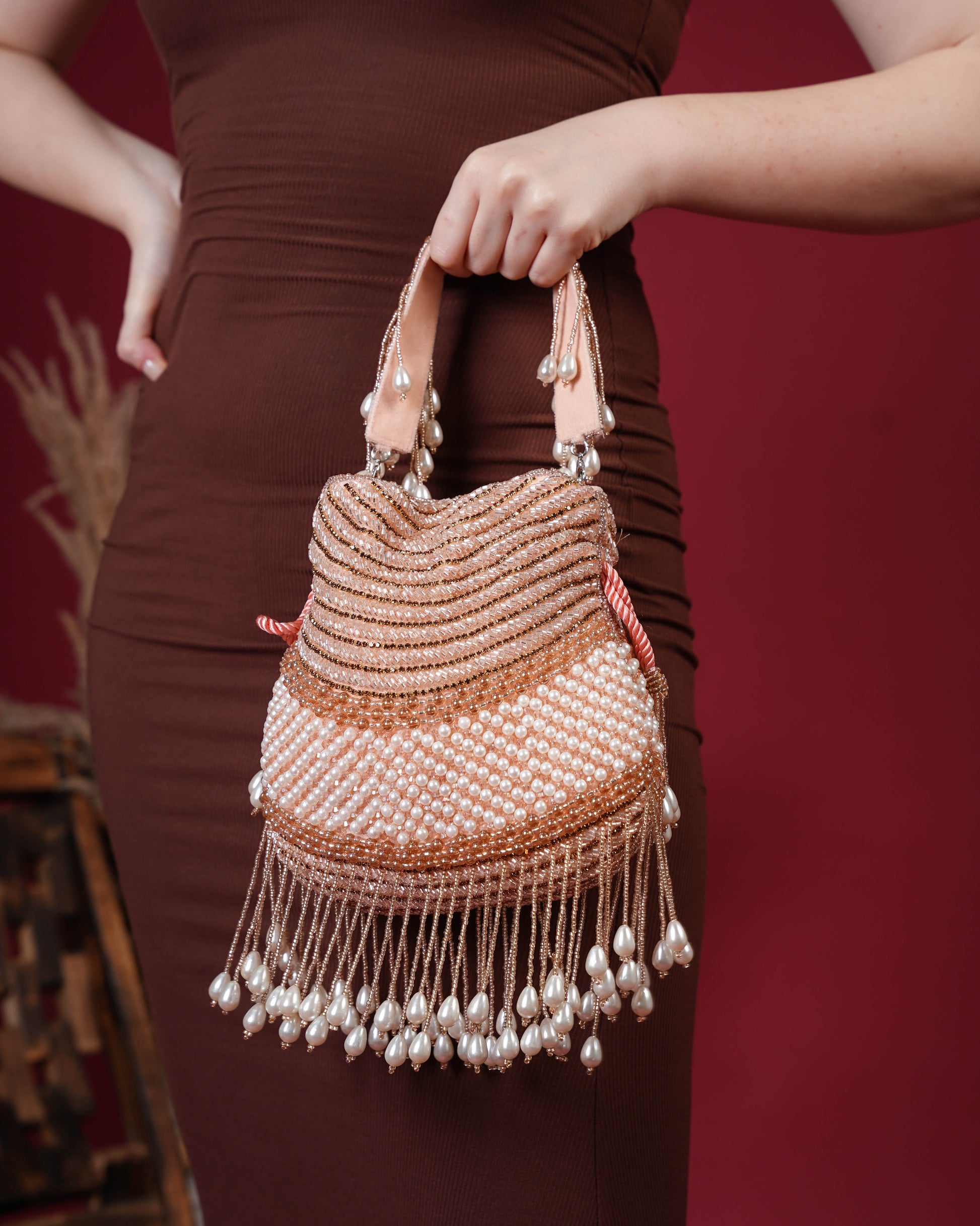Seraphina Gleam Potli – Peach Pearl Drop Embellished Bag