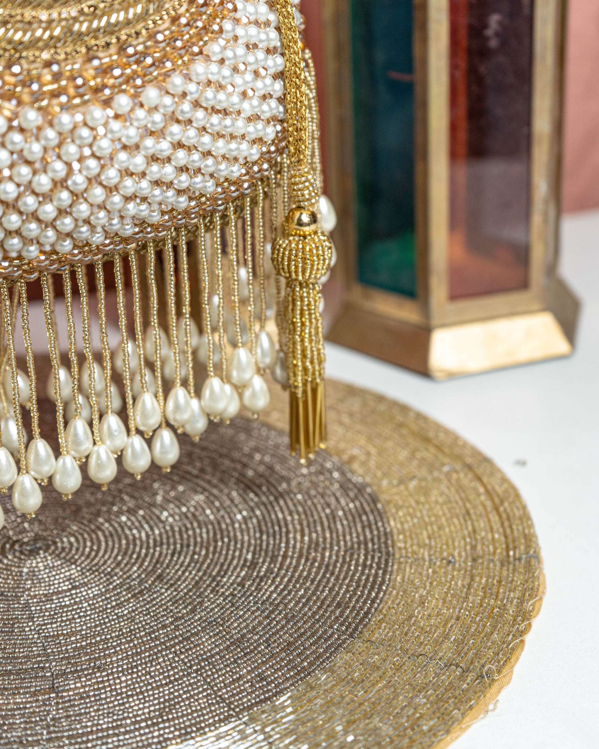 Seraphina Gleam Potli – Golden Pearl Drop Embellished Bag