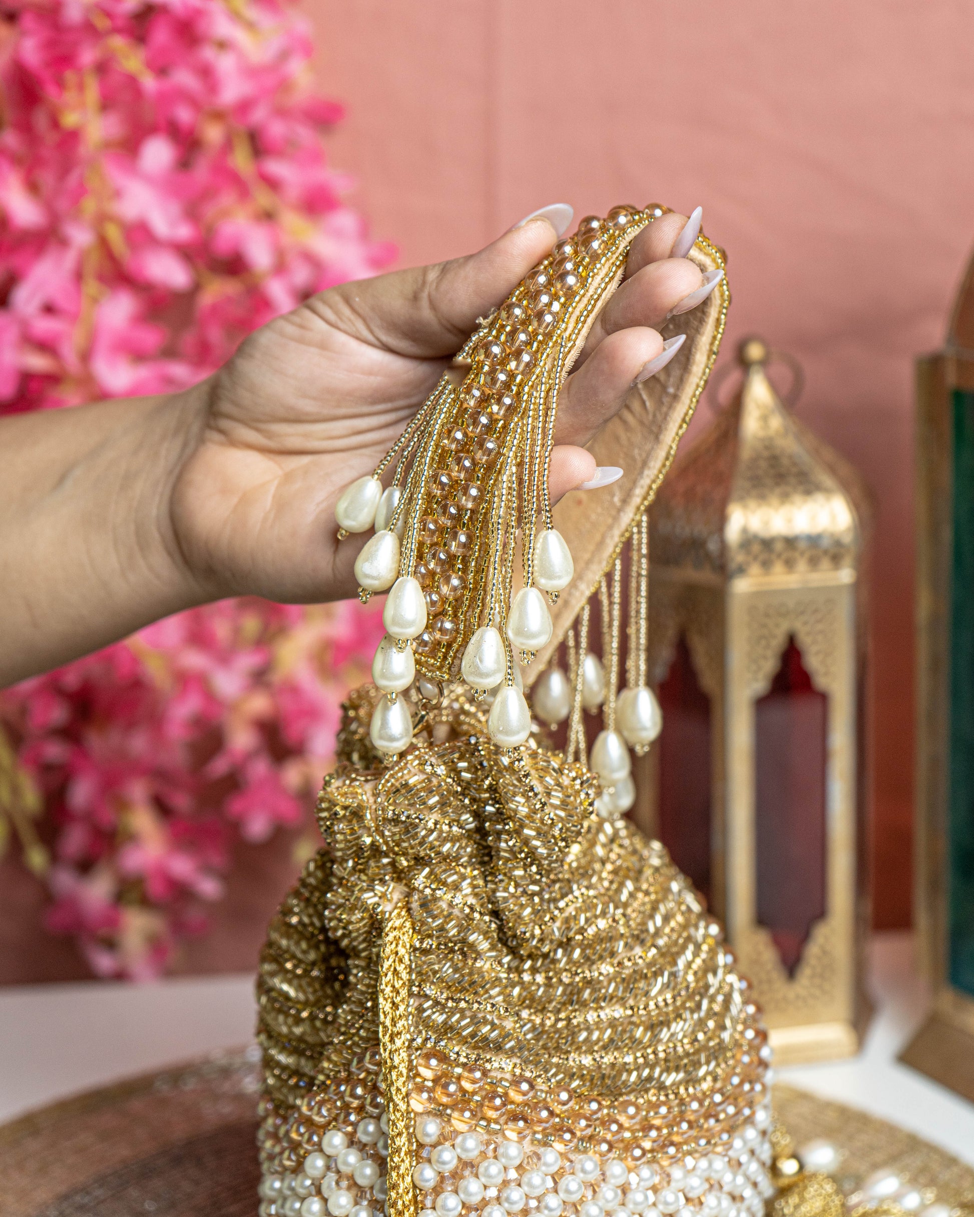 Seraphina Gleam Potli – Golden Pearl Drop Embellished Bag