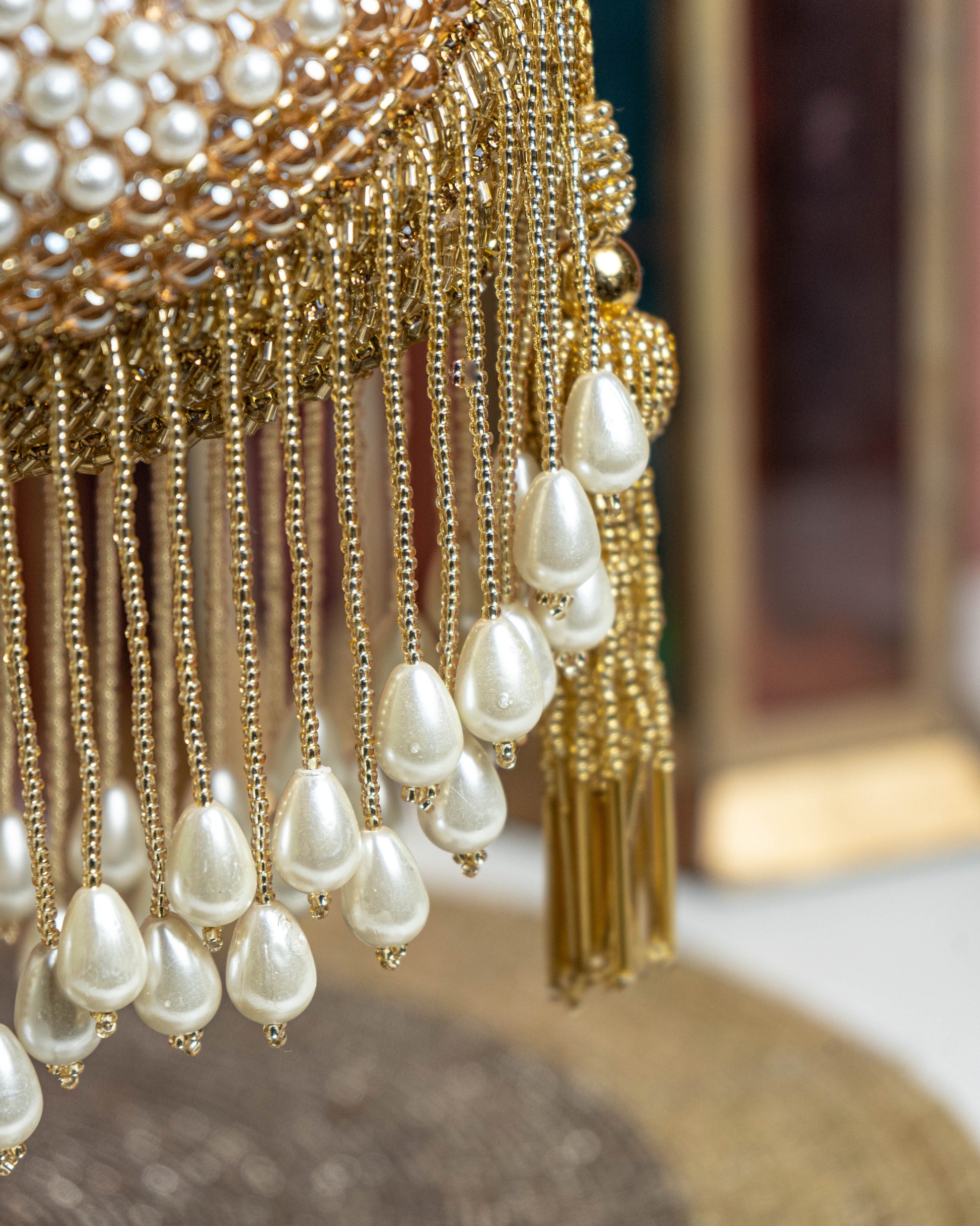 Seraphina Gleam Potli – Golden Pearl Drop Embellished Bag