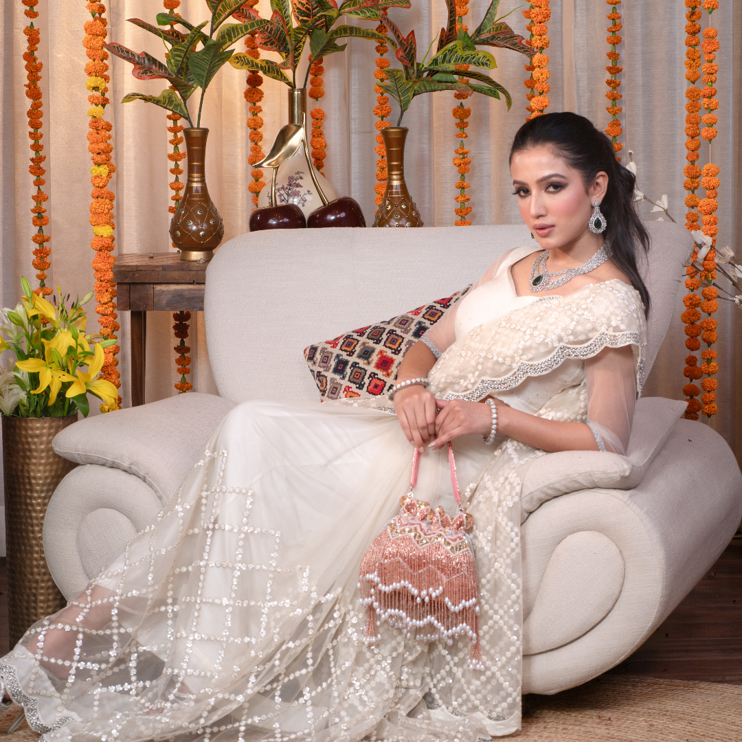Zeenat Beaded Potli Bag – Peach Hand-Embroidered Purse with Pearl Tassels