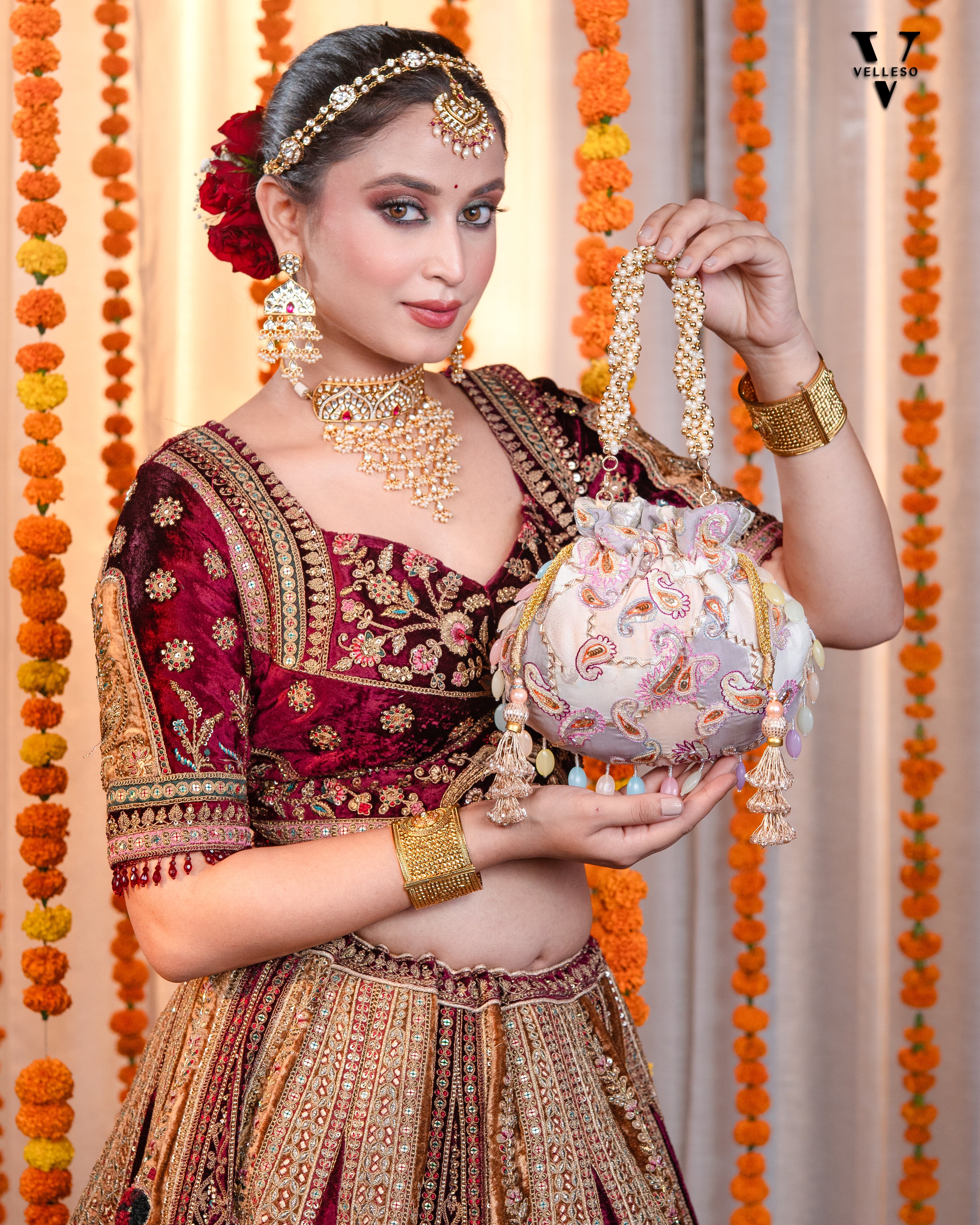 Sitara Round Potli Bag with Pastel Paisley Embroidery & Pearl Handle