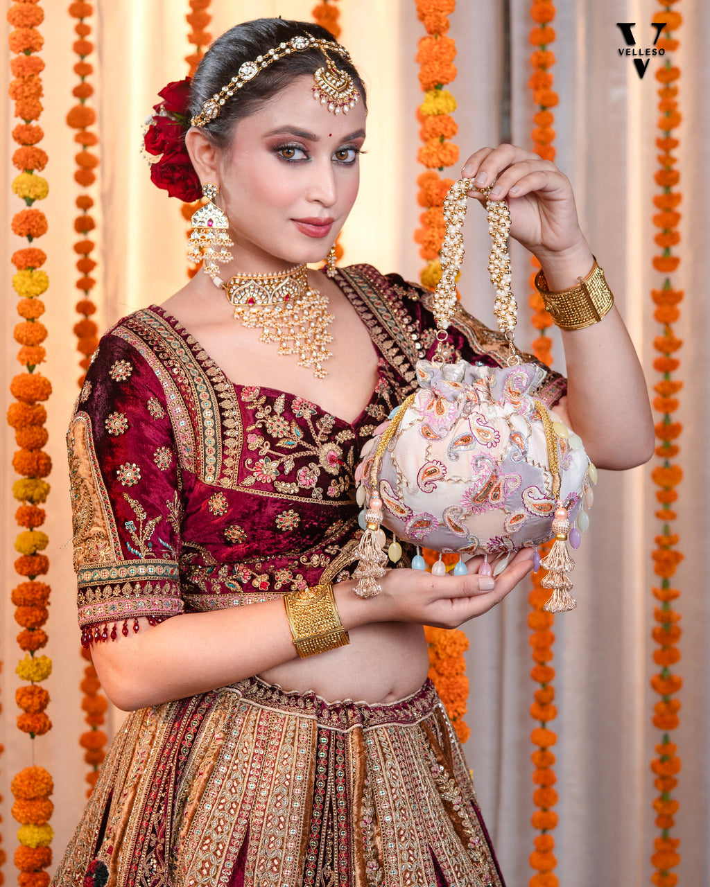 Sitara Round Potli Bag with Pastel Paisley Embroidery & Pearl Handle