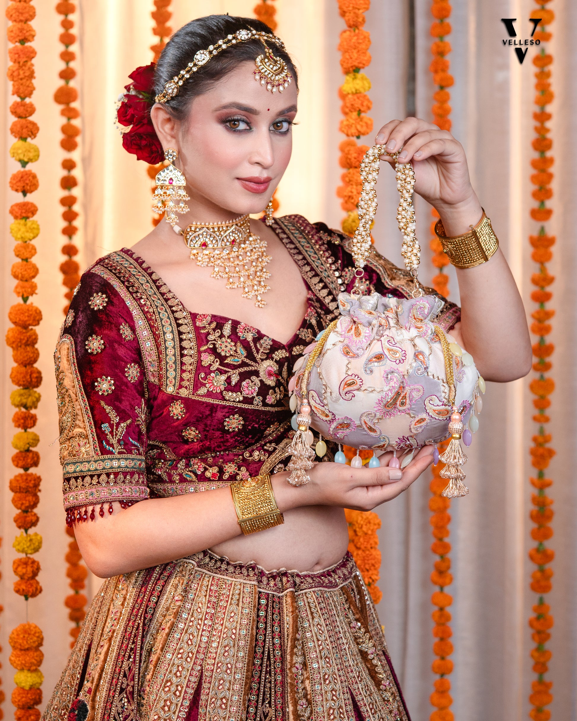 Sitara Round Potli Bag with Pastel Paisley Embroidery & Pearl Handle