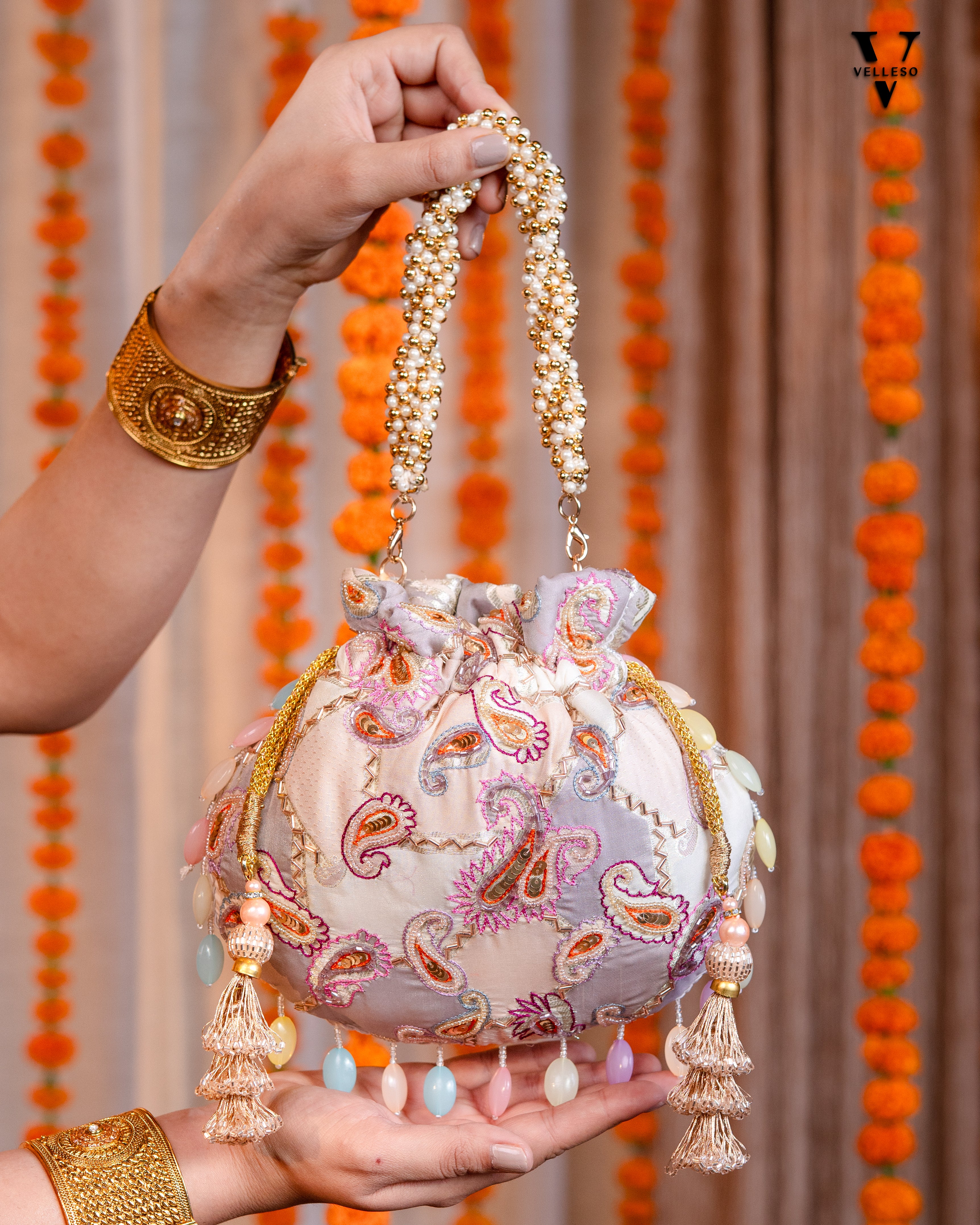 Sitara Round Potli Bag with Pastel Paisley Embroidery & Pearl Handle