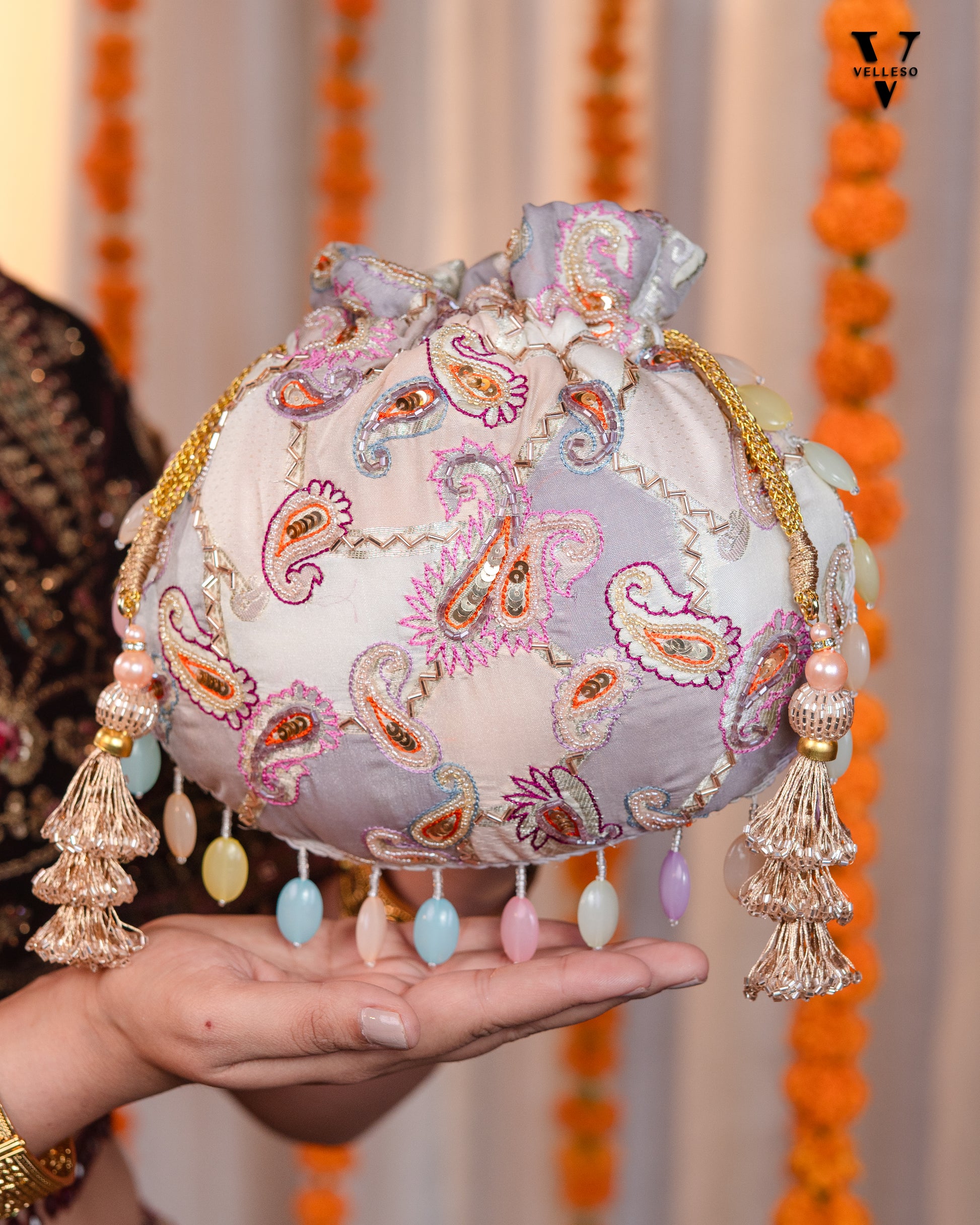 Sitara Round Potli Bag with Pastel Paisley Embroidery & Pearl Handle