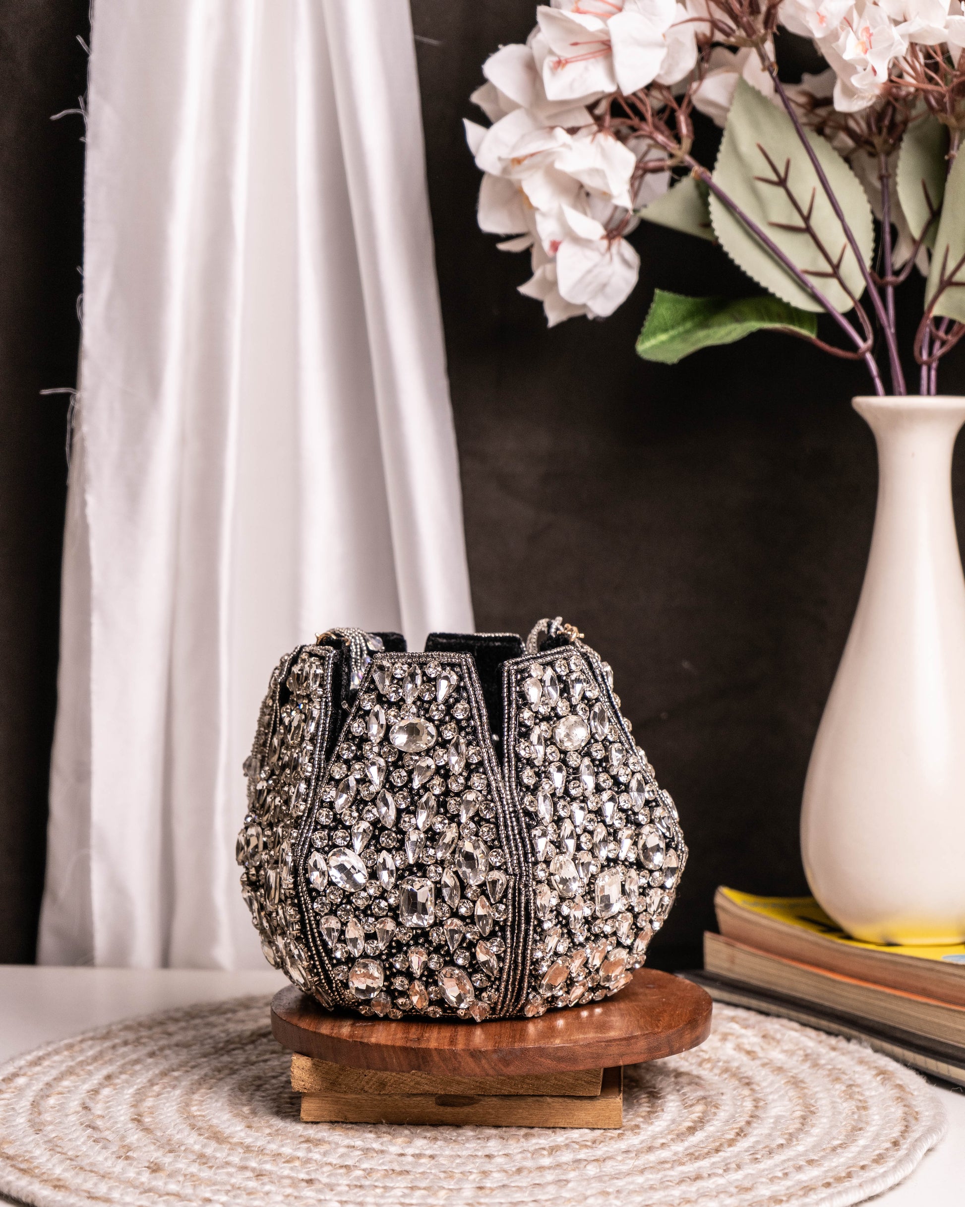 Noor Black Crystal Potli – Hand-Embellished Velvet Bag with Fringe Handle