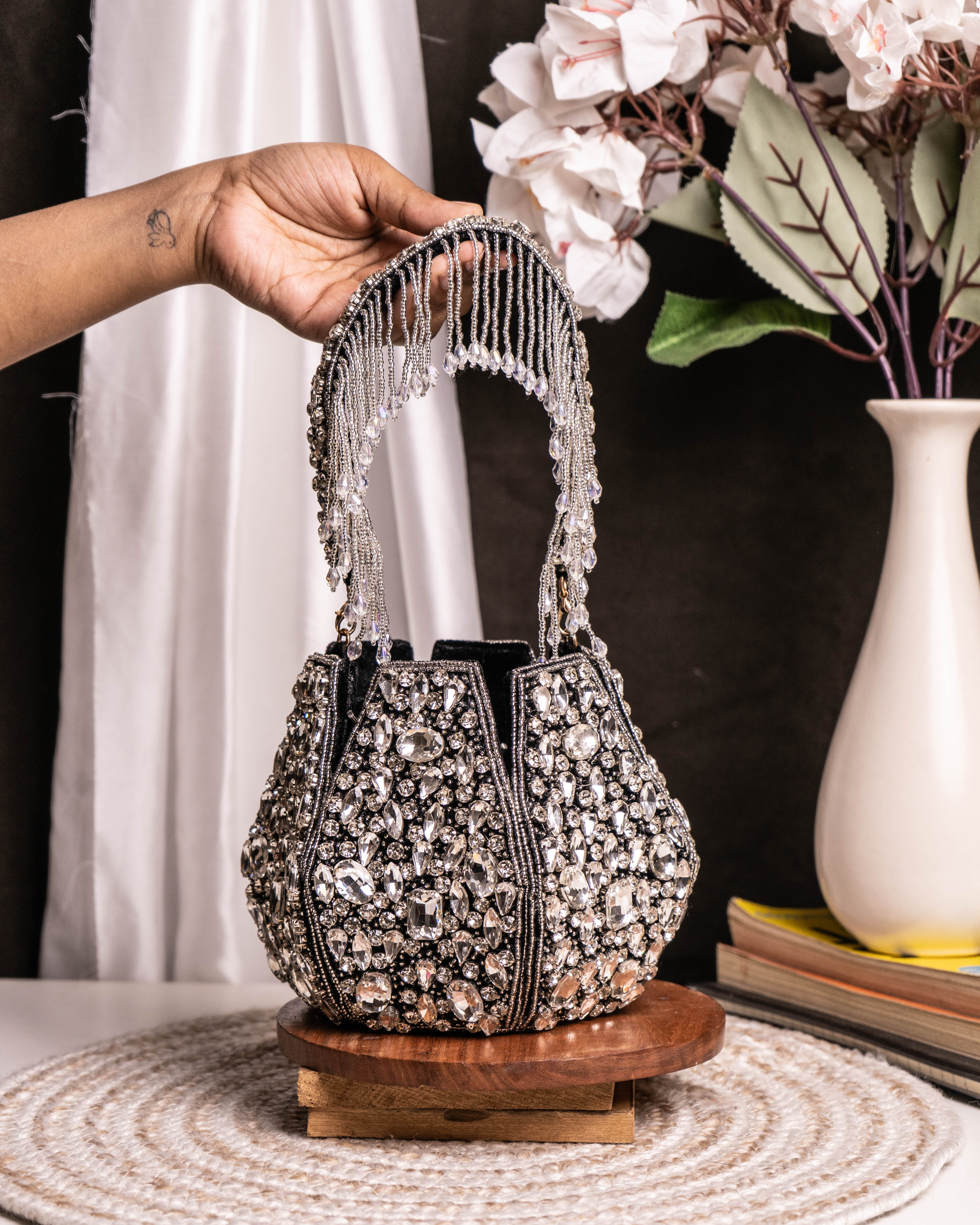 Noor Black Crystal Potli – Hand-Embellished Velvet Bag with Fringe Handle