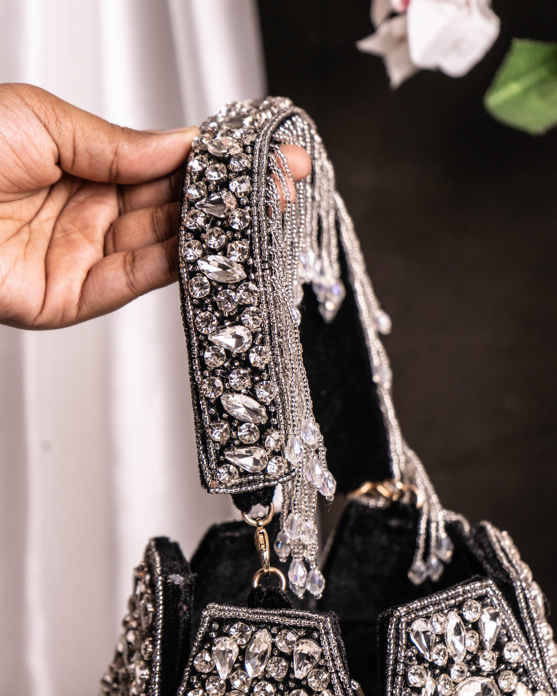Noor Black Crystal Potli – Hand-Embellished Velvet Bag with Fringe Handle