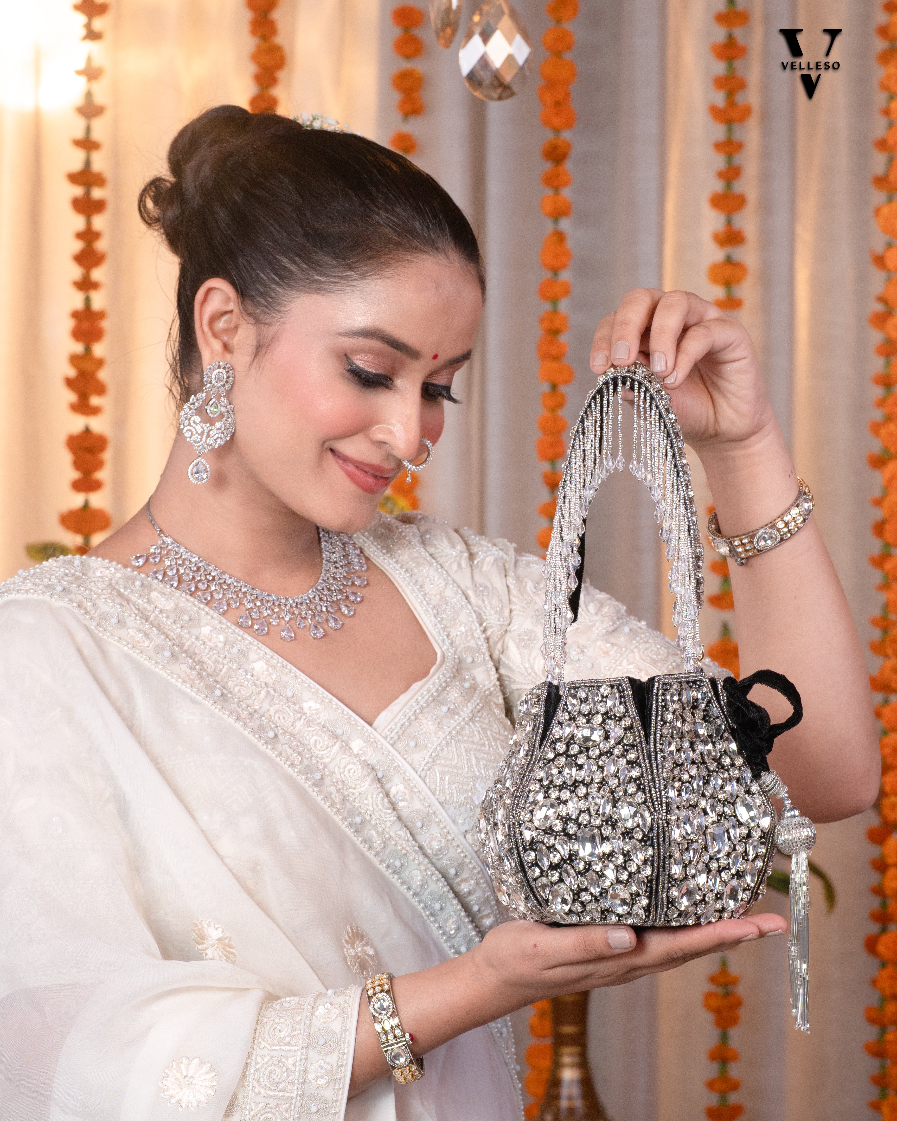 Noor Black Crystal Potli – Hand-Embellished Velvet Bag with Fringe Handle