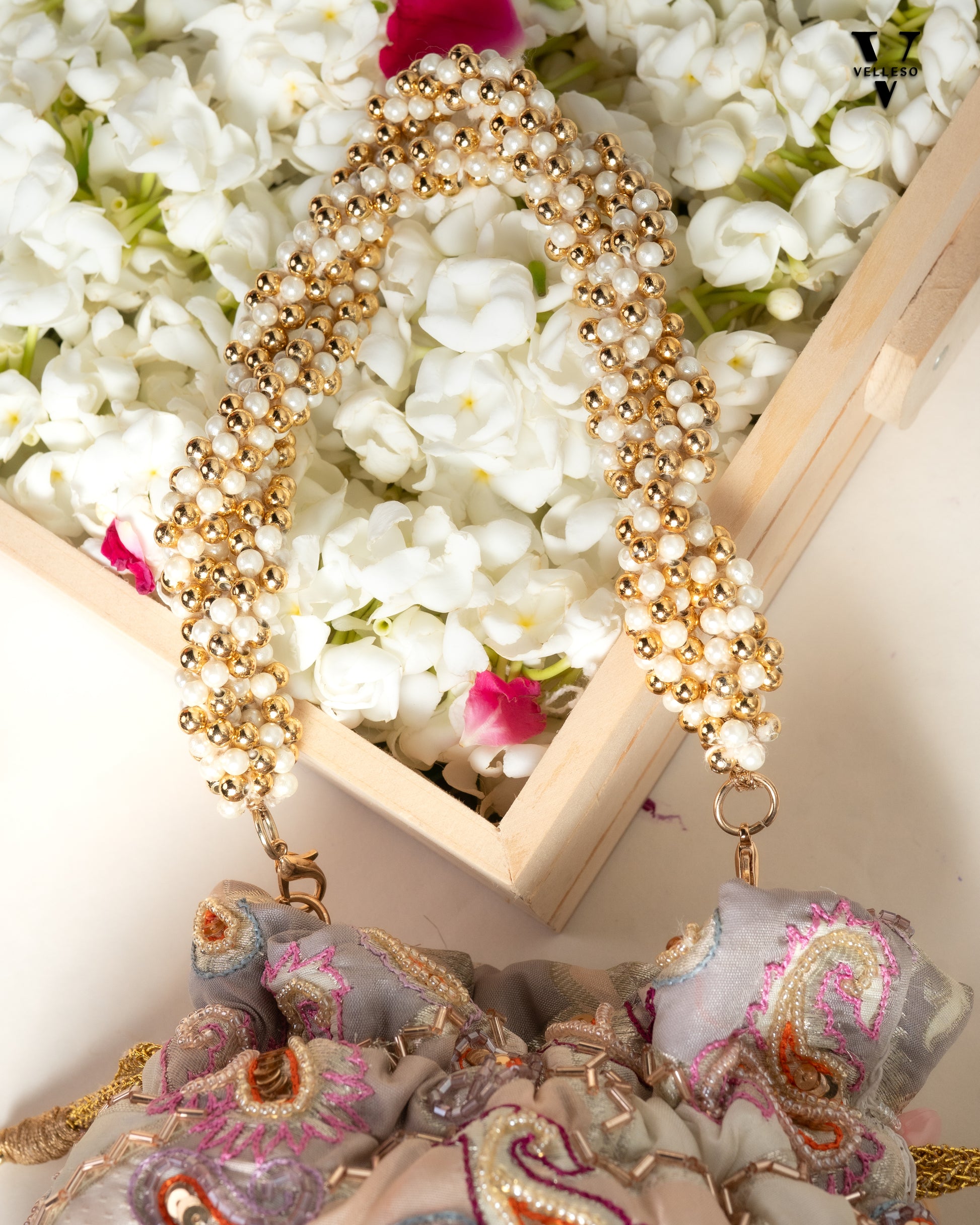 Sitara Round Potli Bag with Pastel Paisley Embroidery & Pearl Handle
