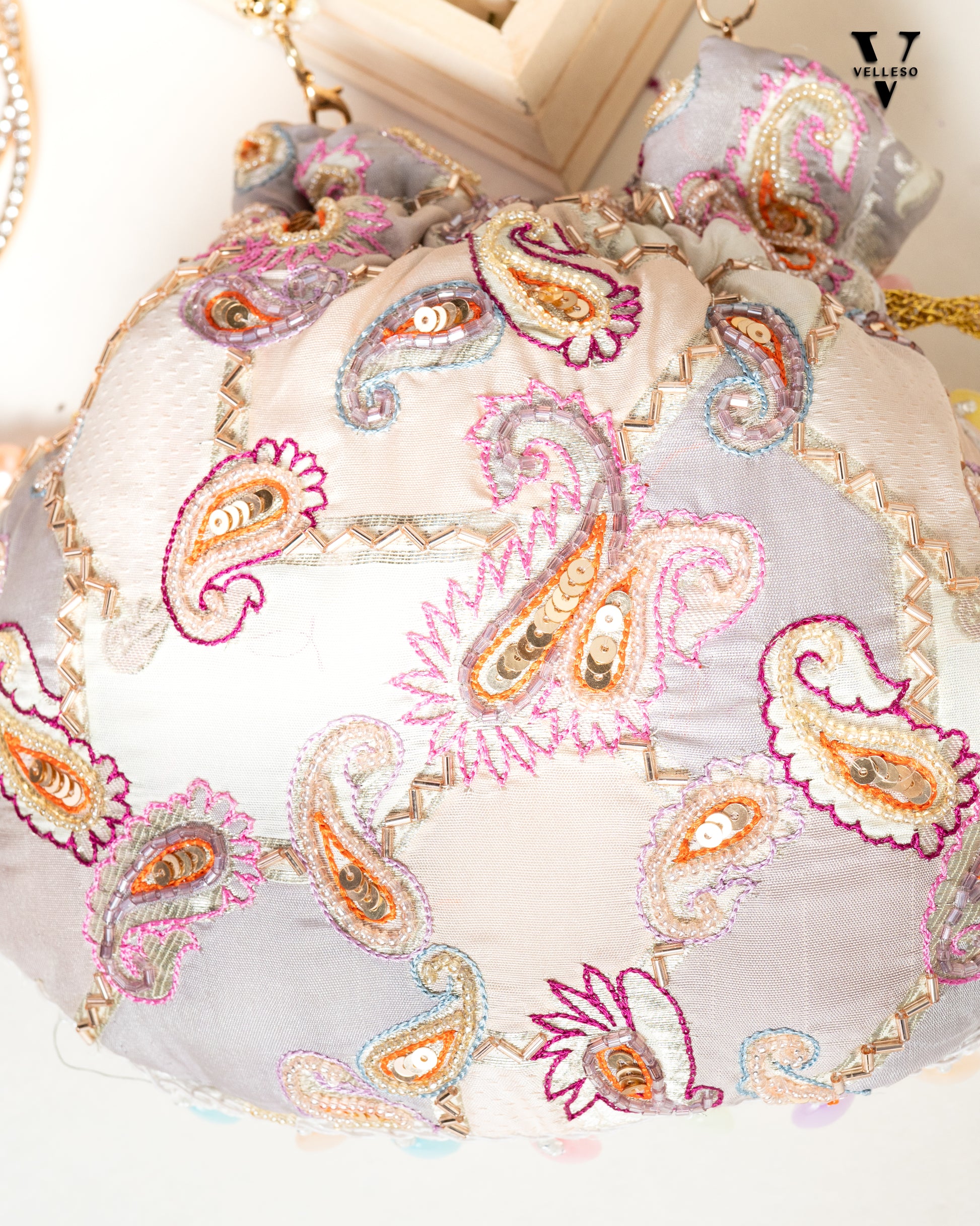 Sitara Round Potli Bag with Pastel Paisley Embroidery & Pearl Handle
