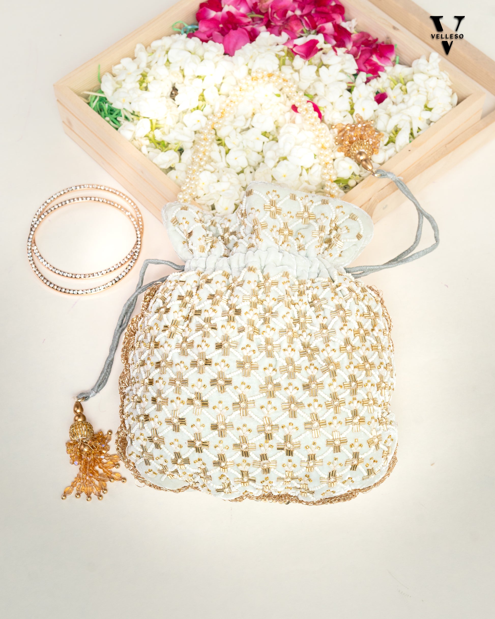 Ivory Bloom Pearl Potli Bag