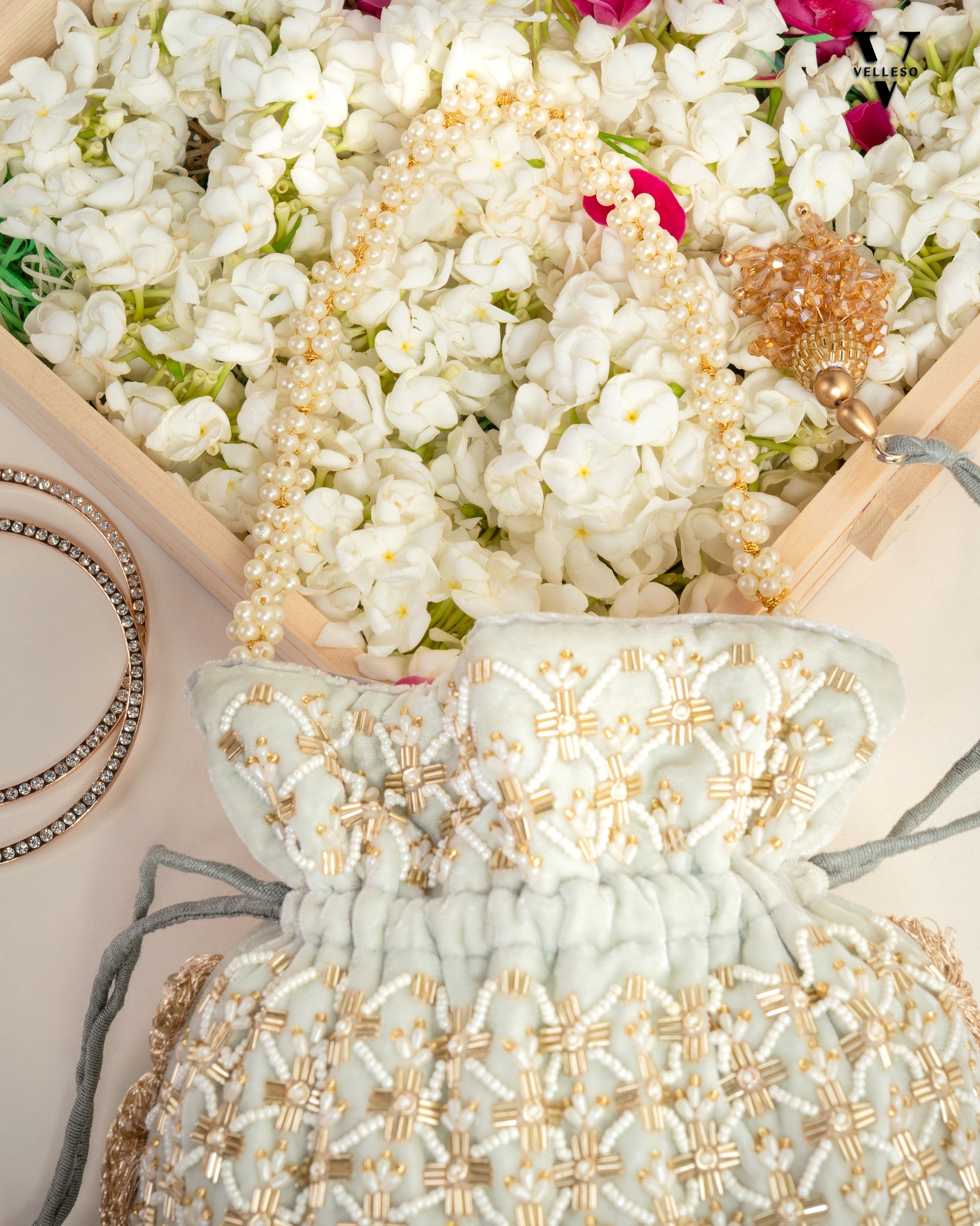 Ivory Bloom Pearl Potli Bag
