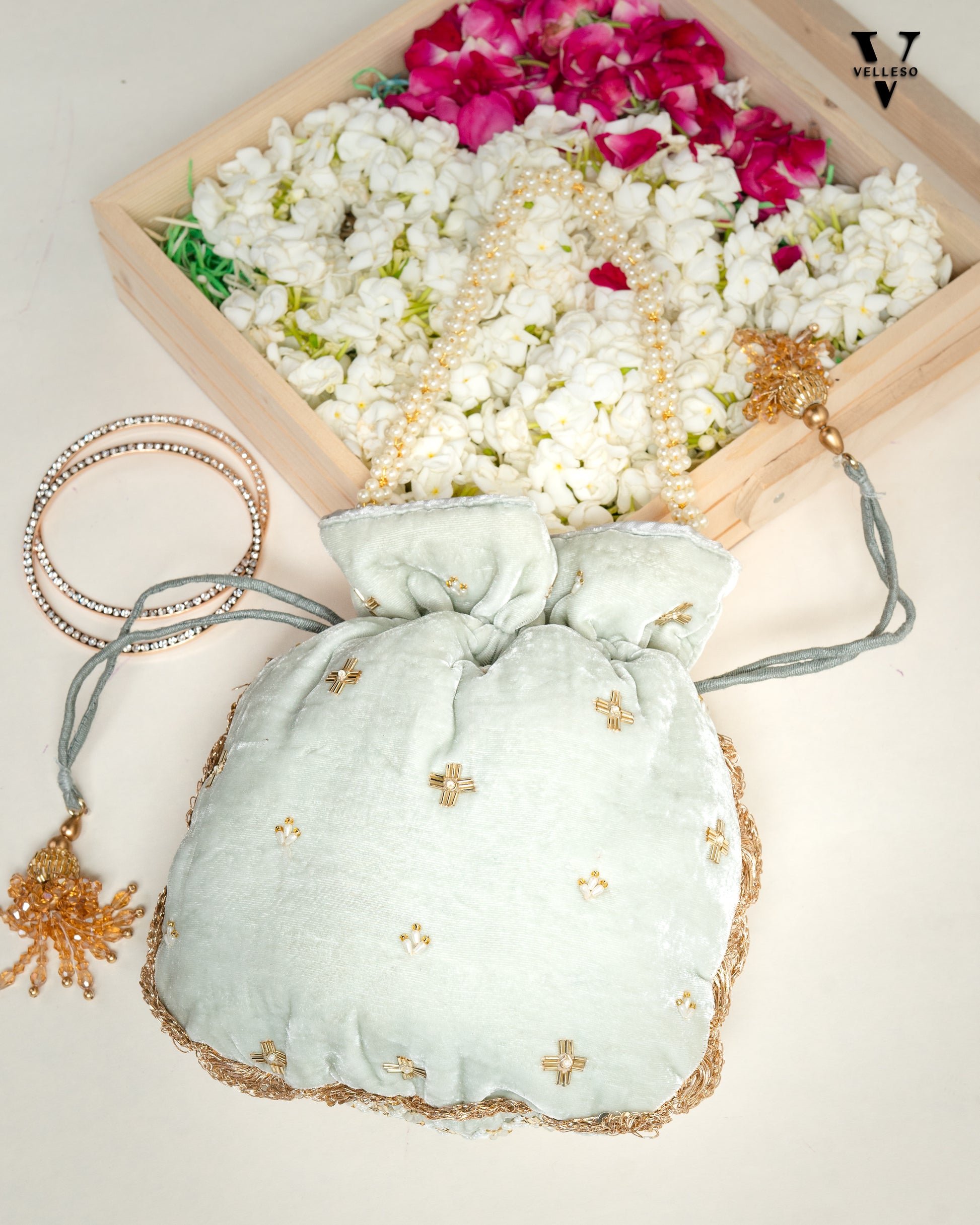 Ivory Bloom Pearl Potli Bag