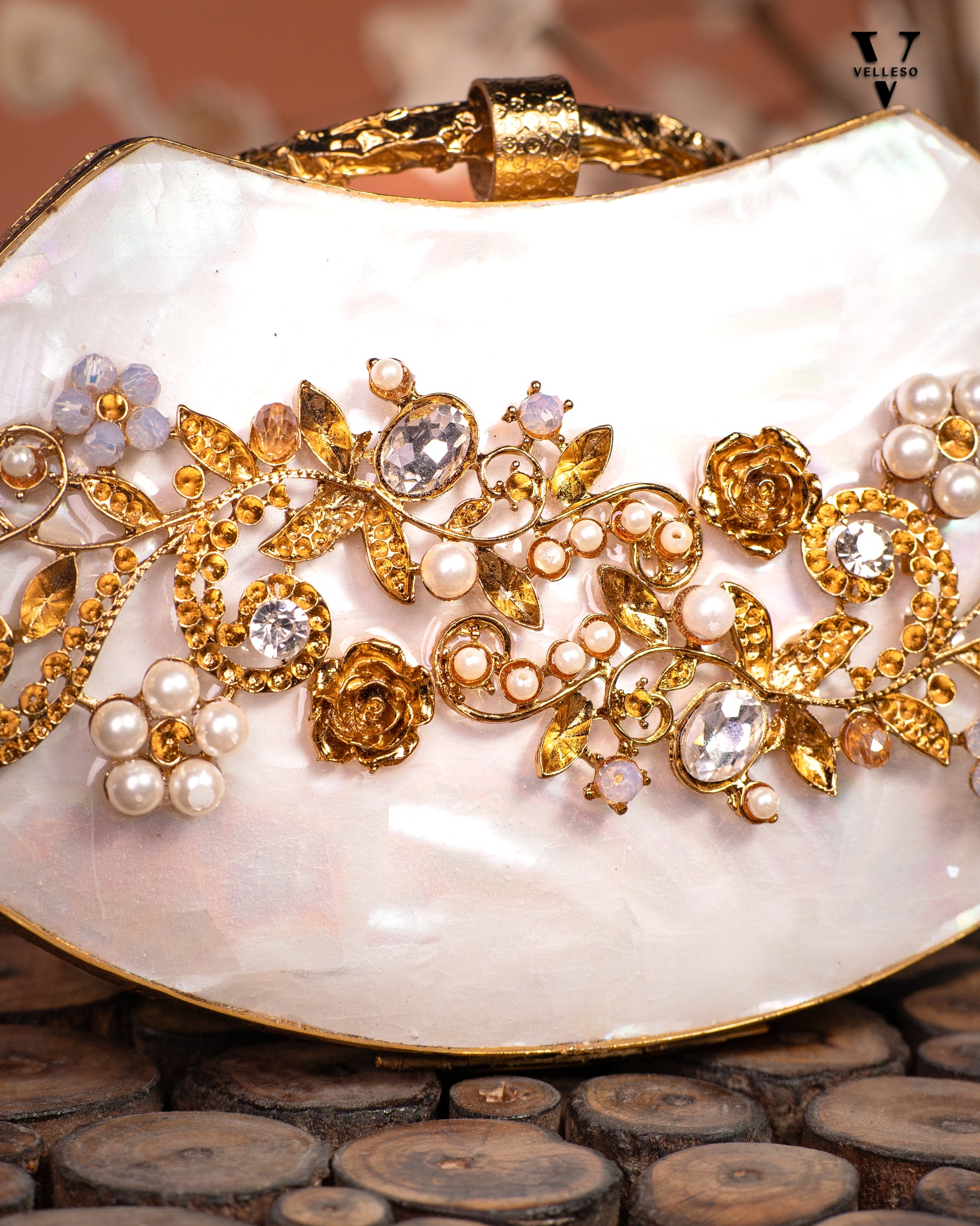Noura Embellished MOP Clutch with Floral Gold Detailing