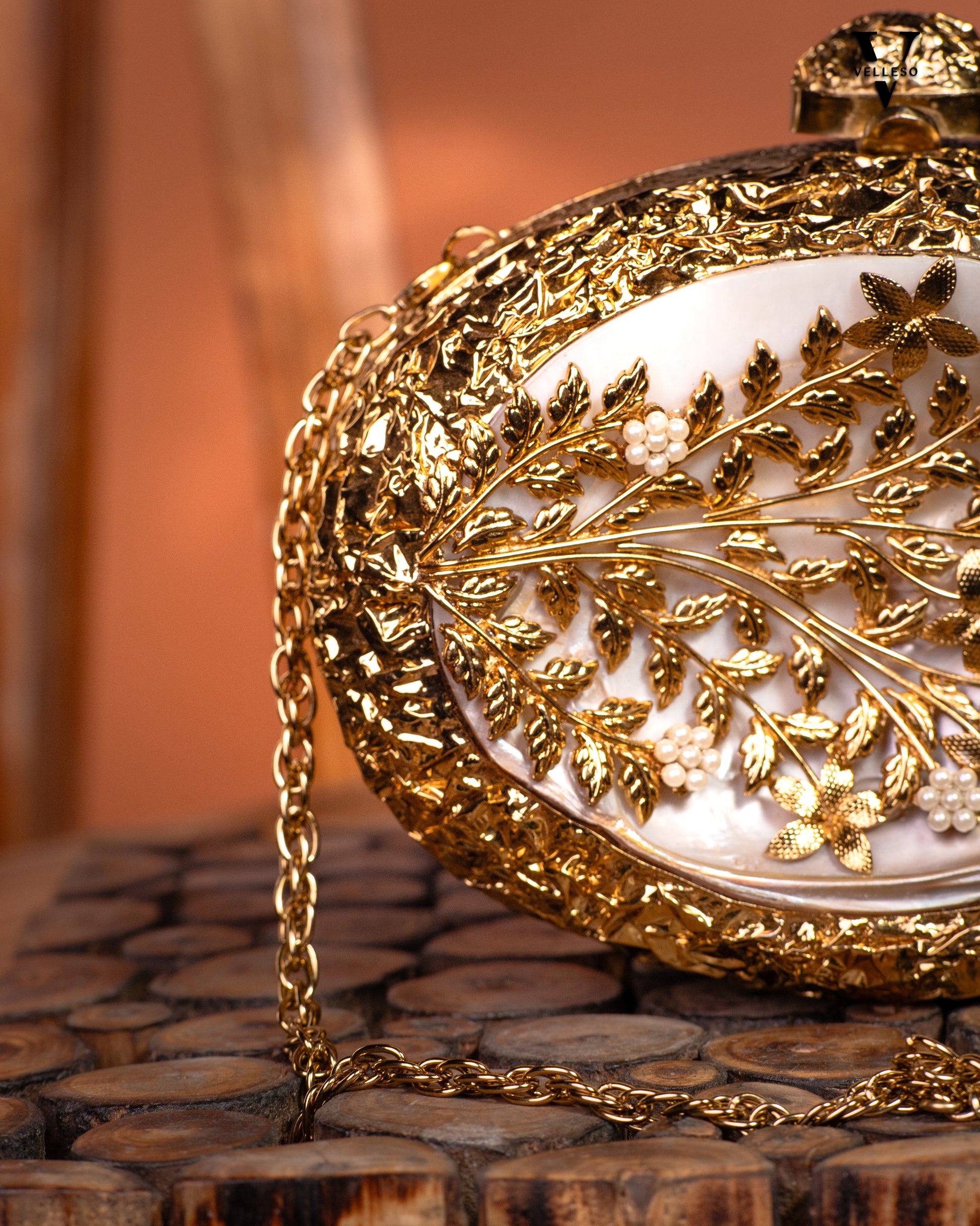 Regal Bloom Gilded MOP Clutch