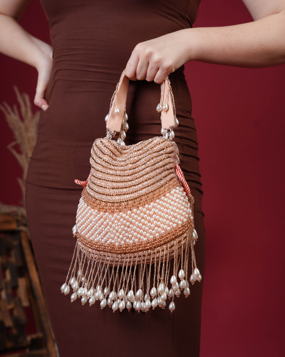 Seraphina Gleam Potli – Peach Pearl Drop Embellished Bag