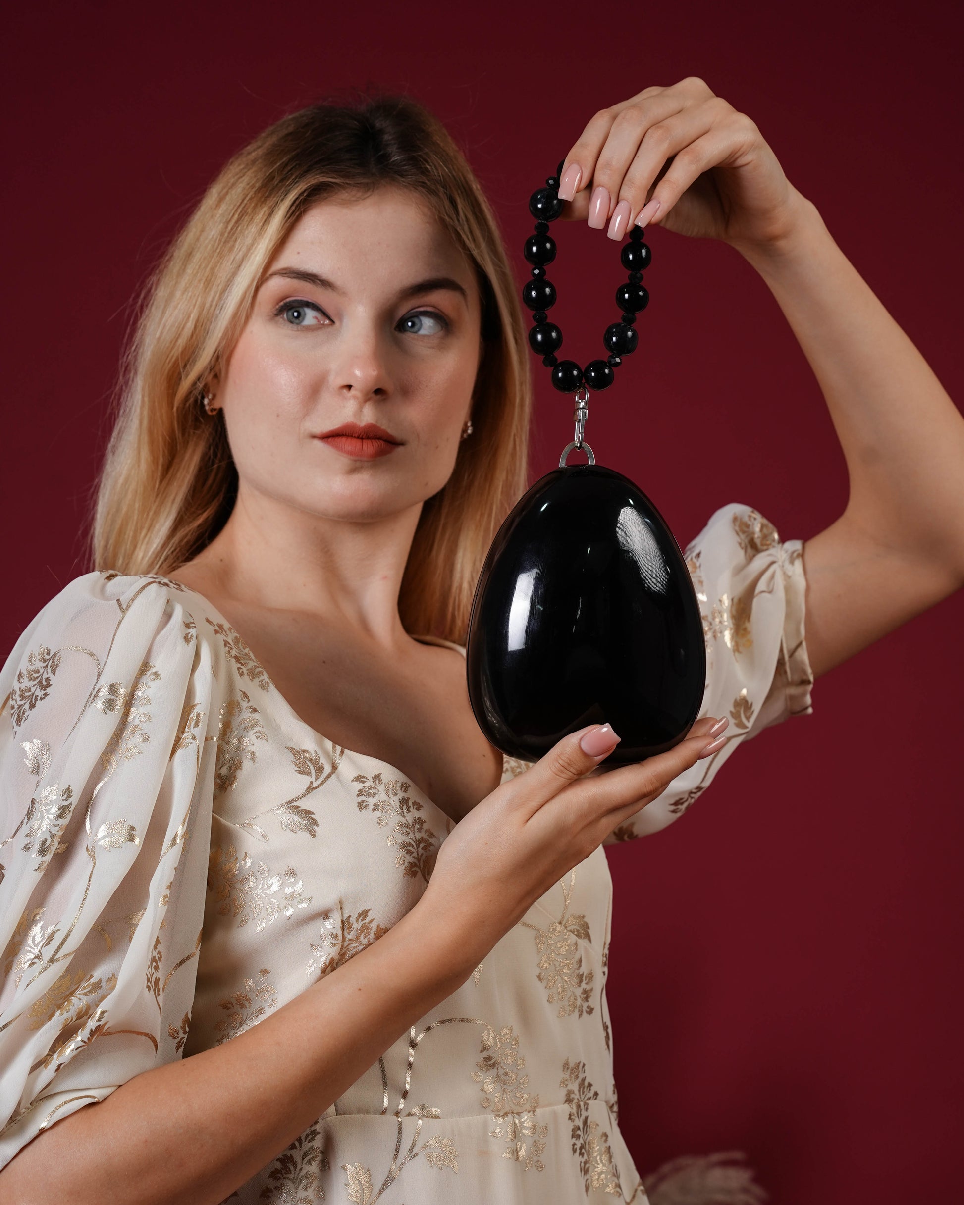 Noir Pebble Orb Clutch