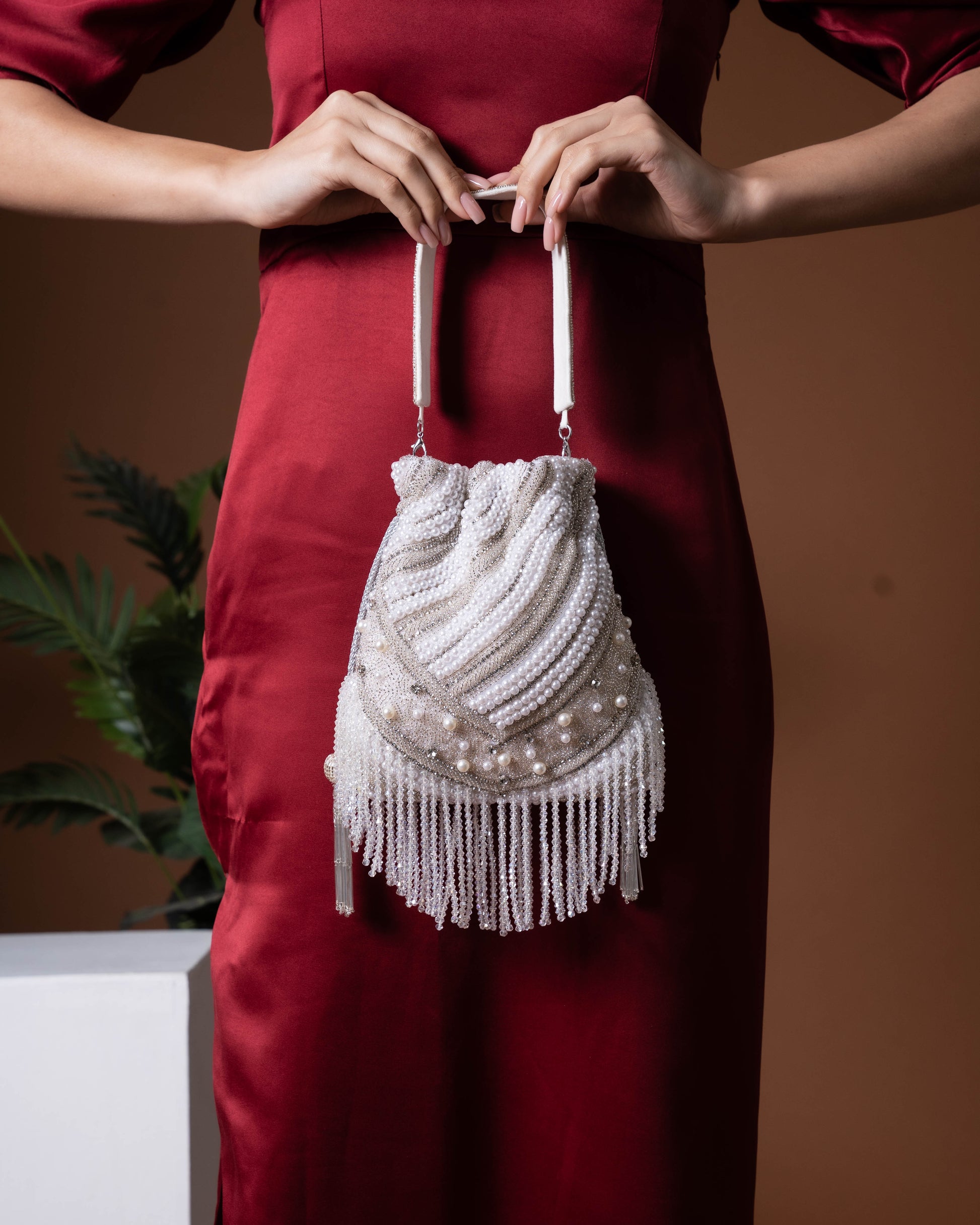 Aurelia Fringe Potli – Handcrafted Pearl Swirl Purse
