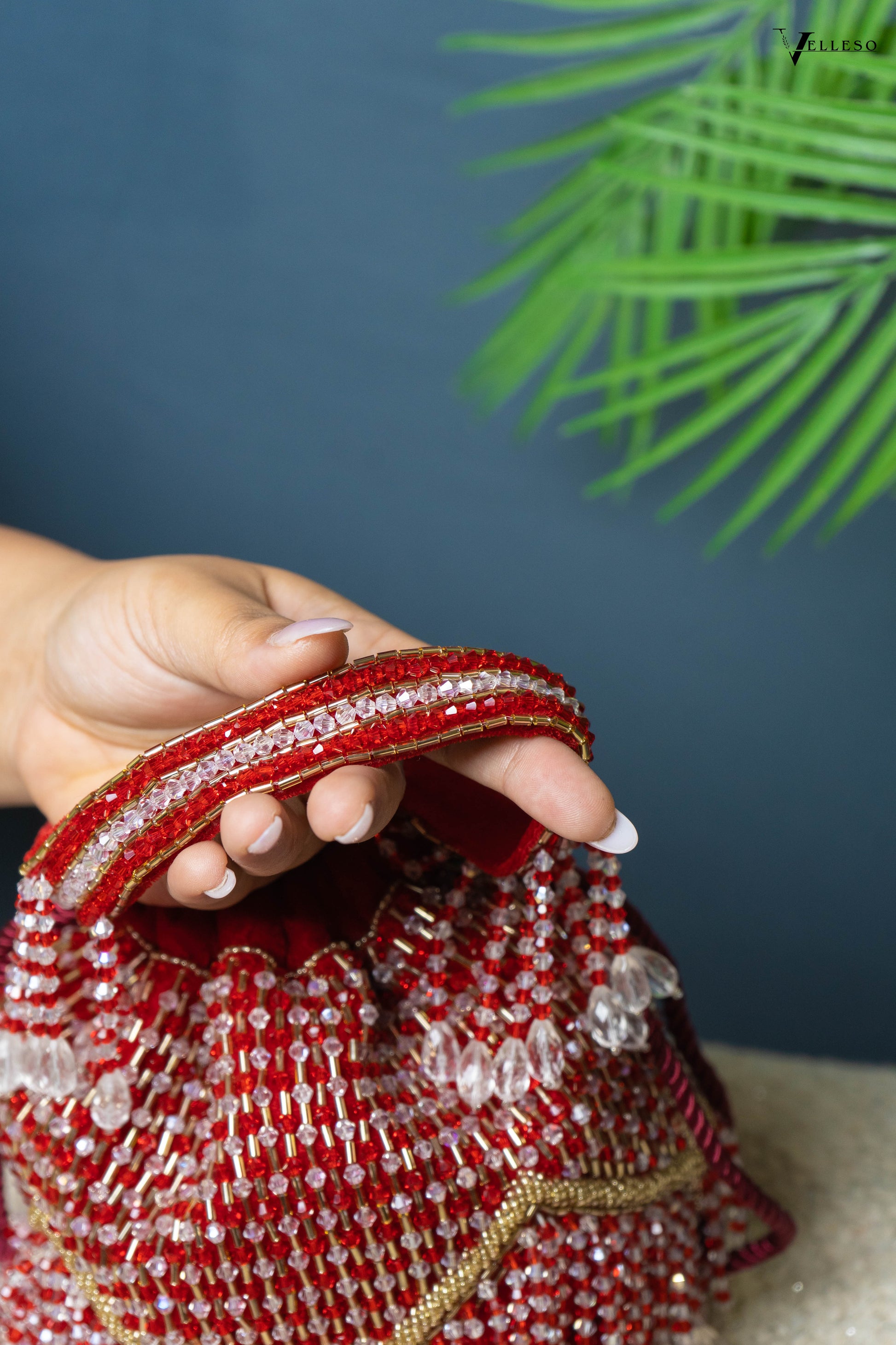 Elira Crystal Fringe Potli