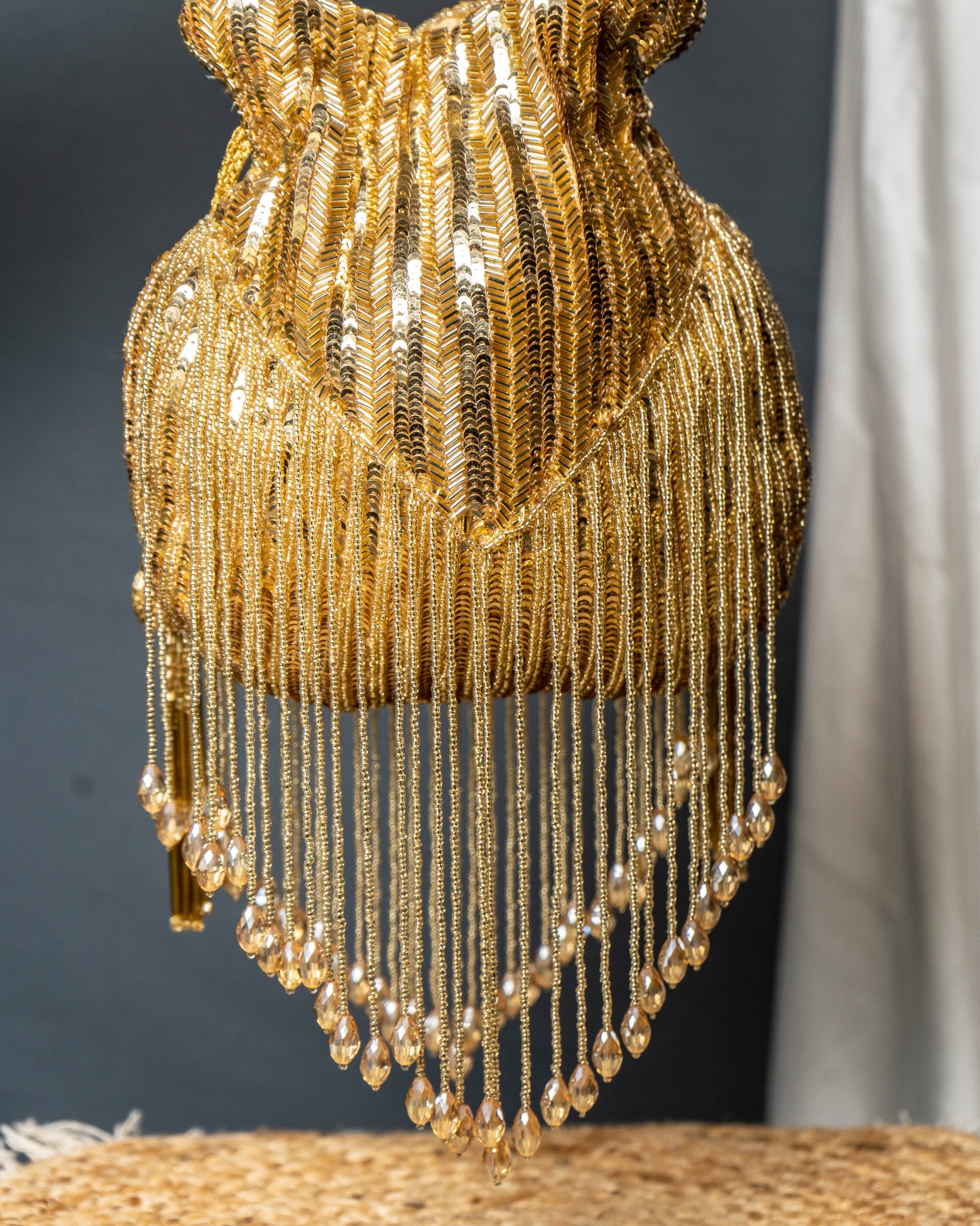 Sitara Gold Fringe Potli – Hand-Beaded Party Bag with Crystal Tassels