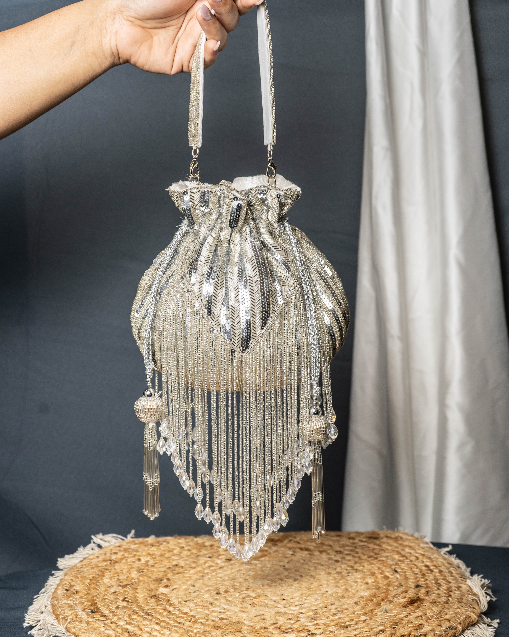 Sitara Silver Fringe Potli – Hand-Beaded Party Bag with Crystal Tassels