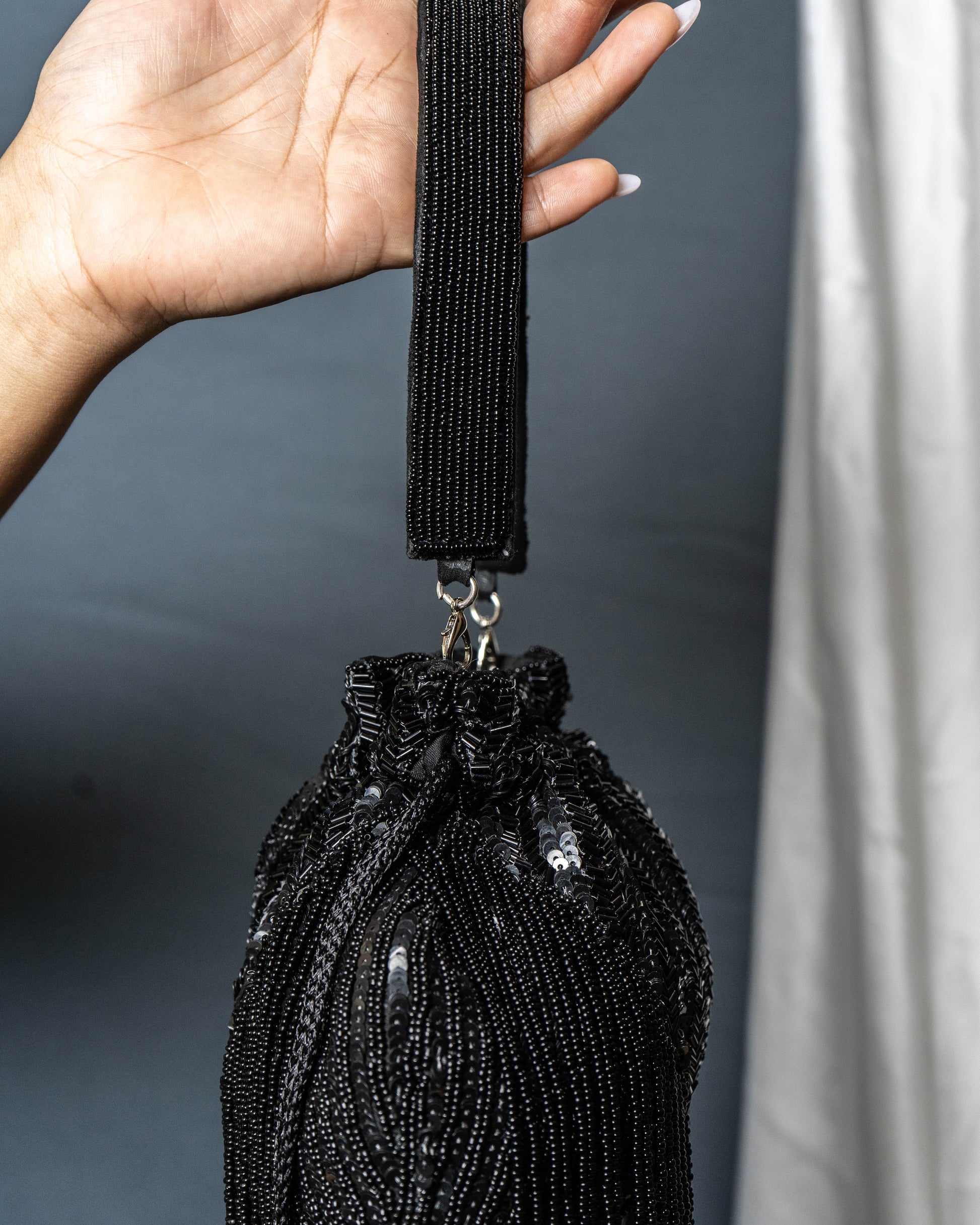 Sitara Black Fringe Potli – Hand-Beaded Party Bag with Crystal Tassels