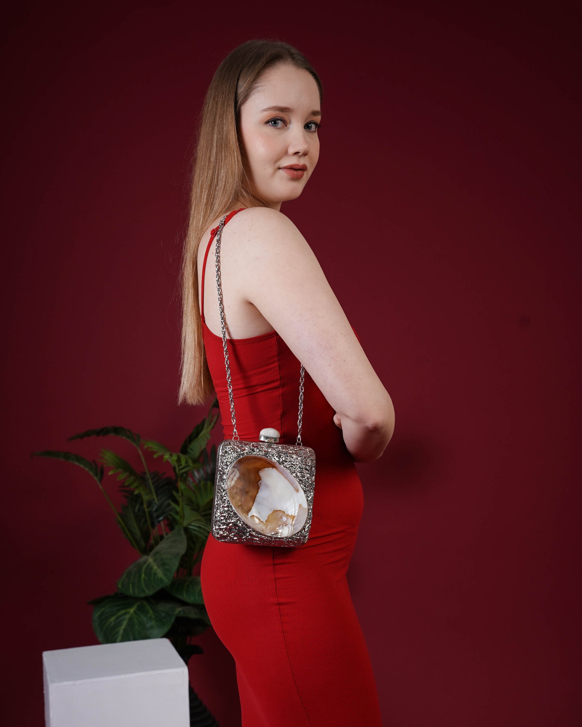 Kaia Raw Shell Metal Clutch