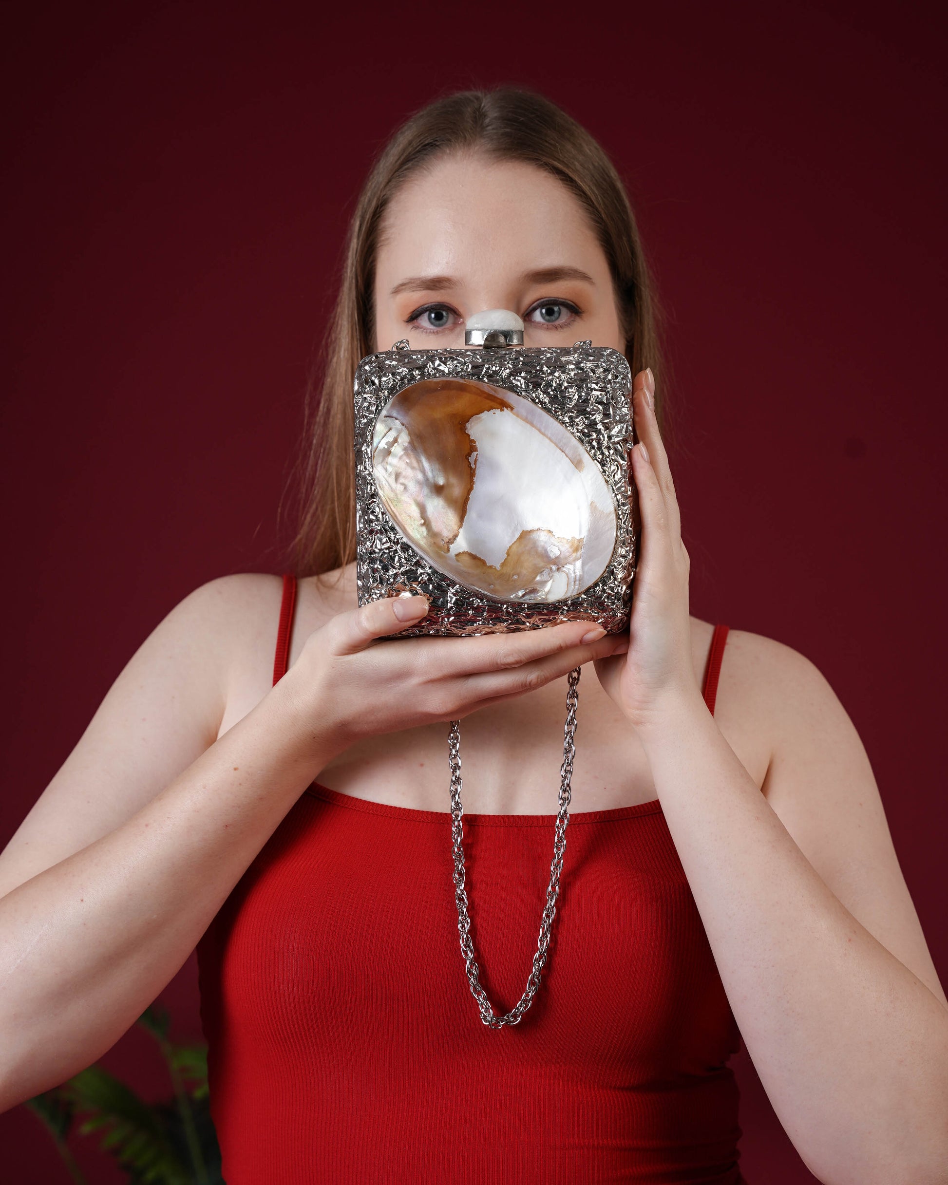 Kaia Raw Shell Metal Clutch