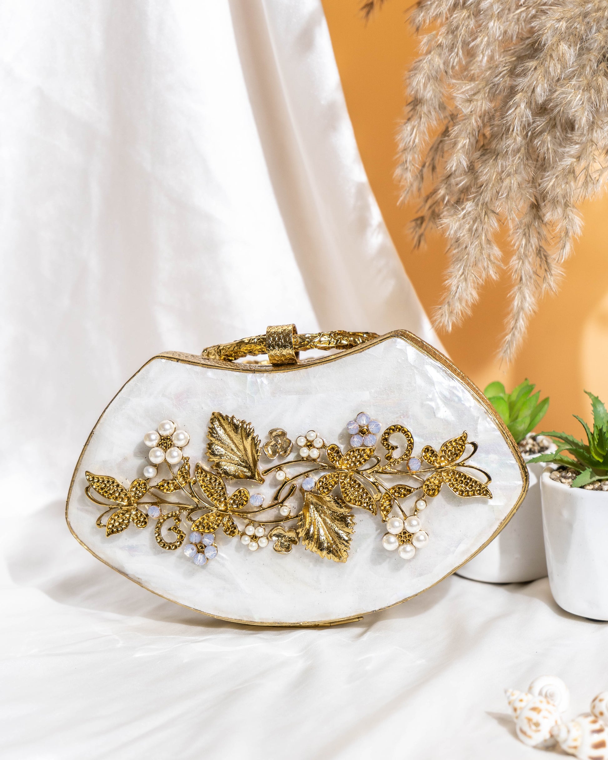Noura Embellished MOP Clutch with Floral Gold Detailing