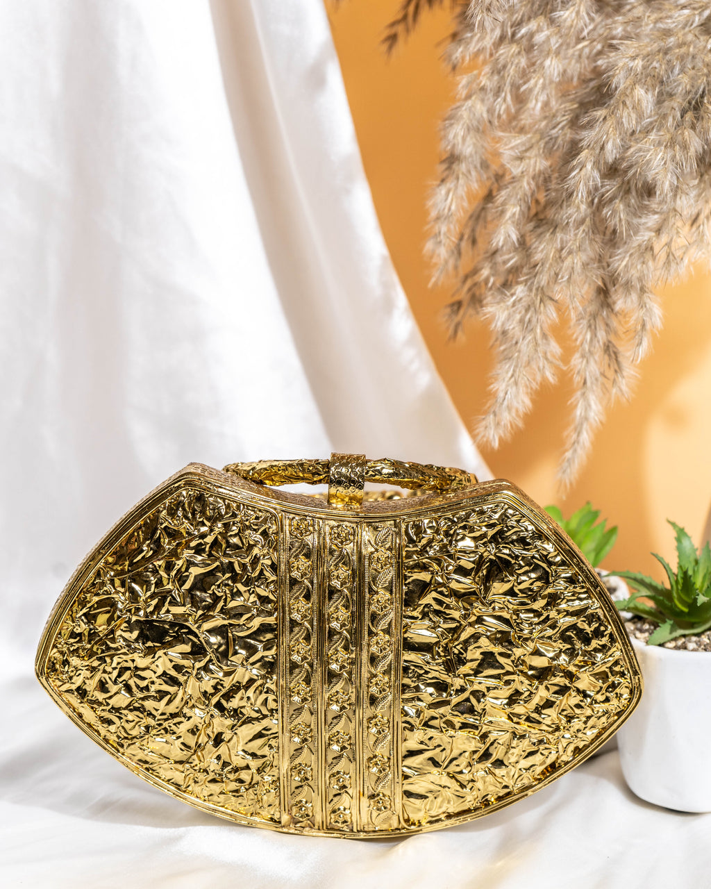 Noura Embellished MOP Clutch with Floral Gold Detailing