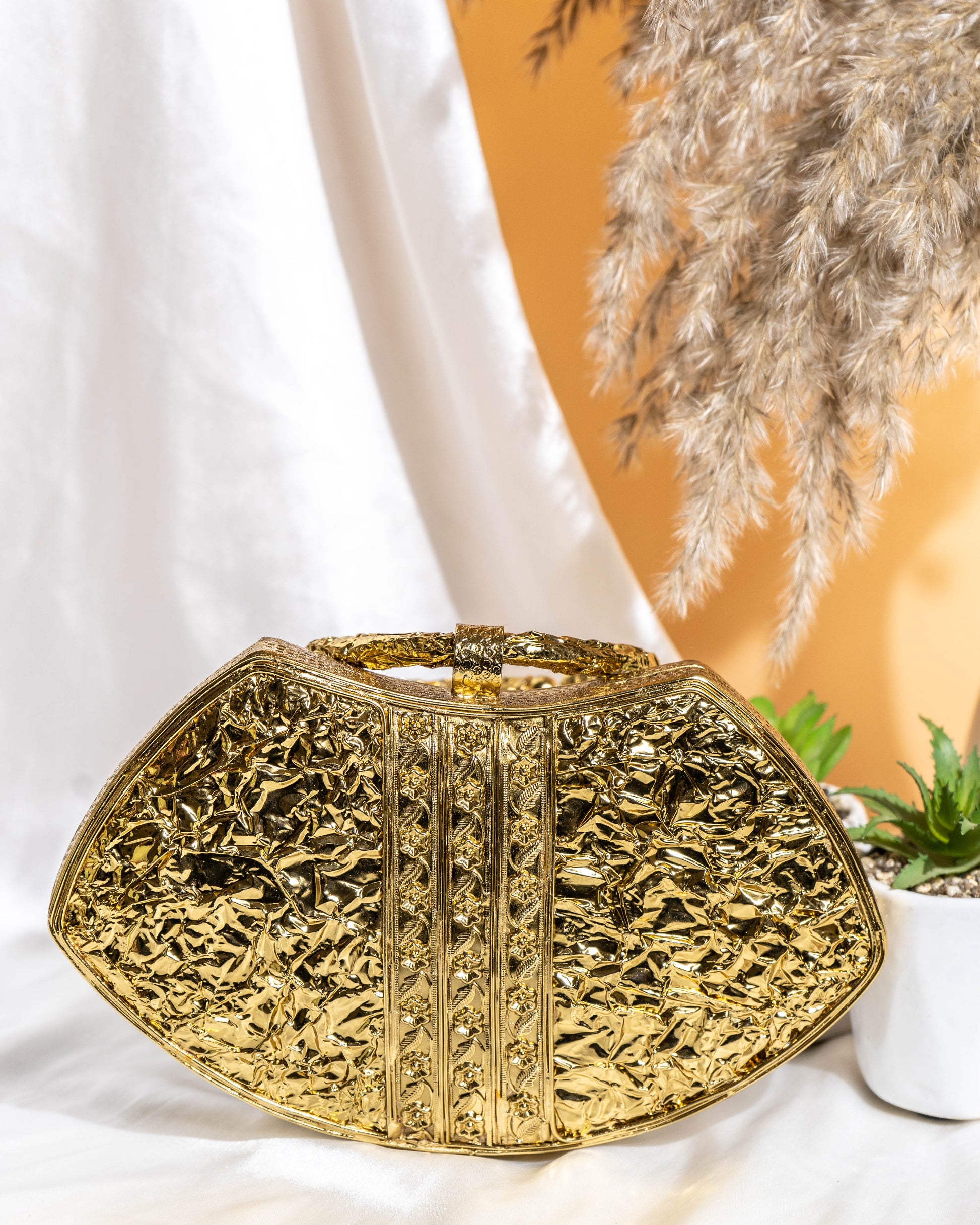 Noura Embellished MOP Clutch with Floral Gold Detailing