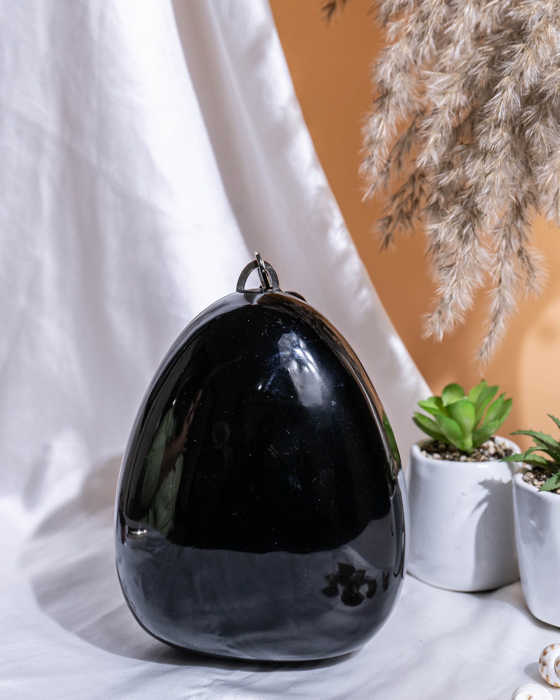Noir Pebble Orb Clutch