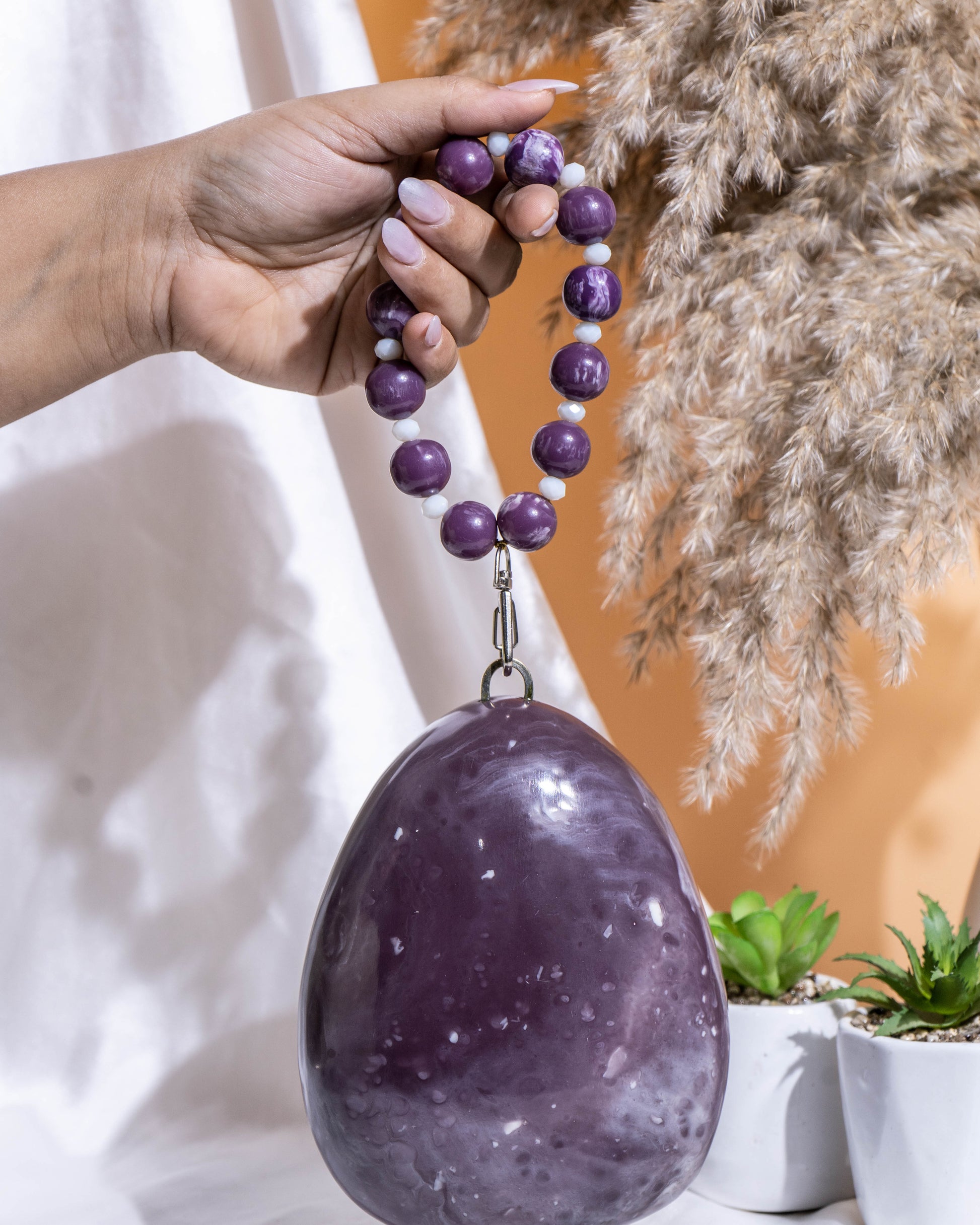 Noir Pebble Orb Clutch