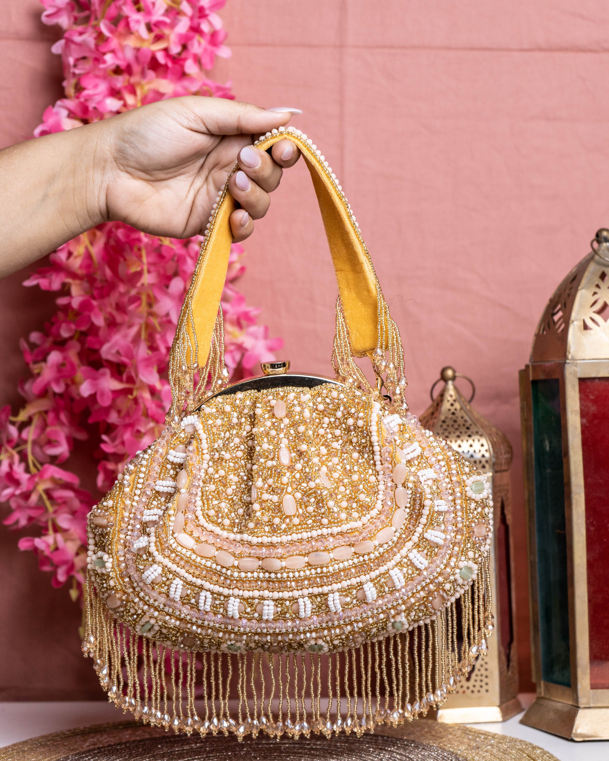 Golden Beaded Handbag with Fringe Detailing