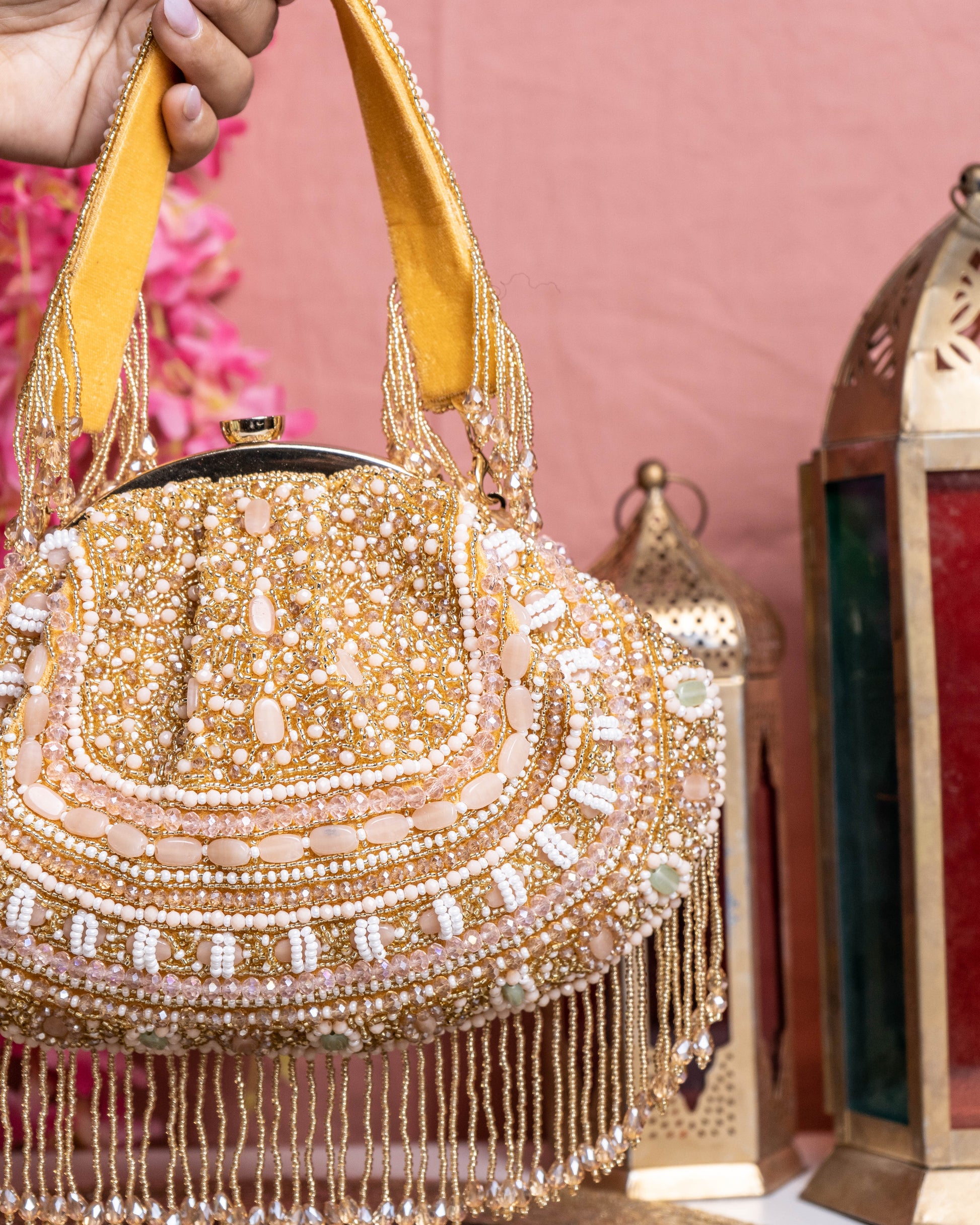 Golden Beaded Handbag with Fringe Detailing