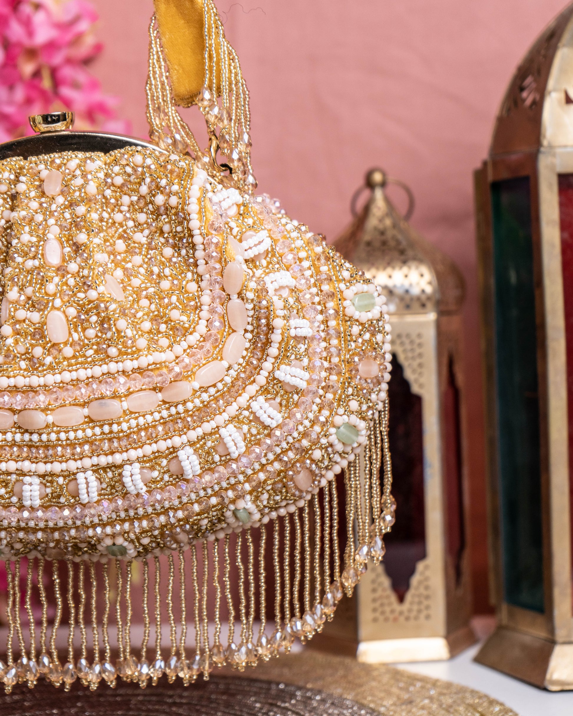 Golden Beaded Handbag with Fringe Detailing