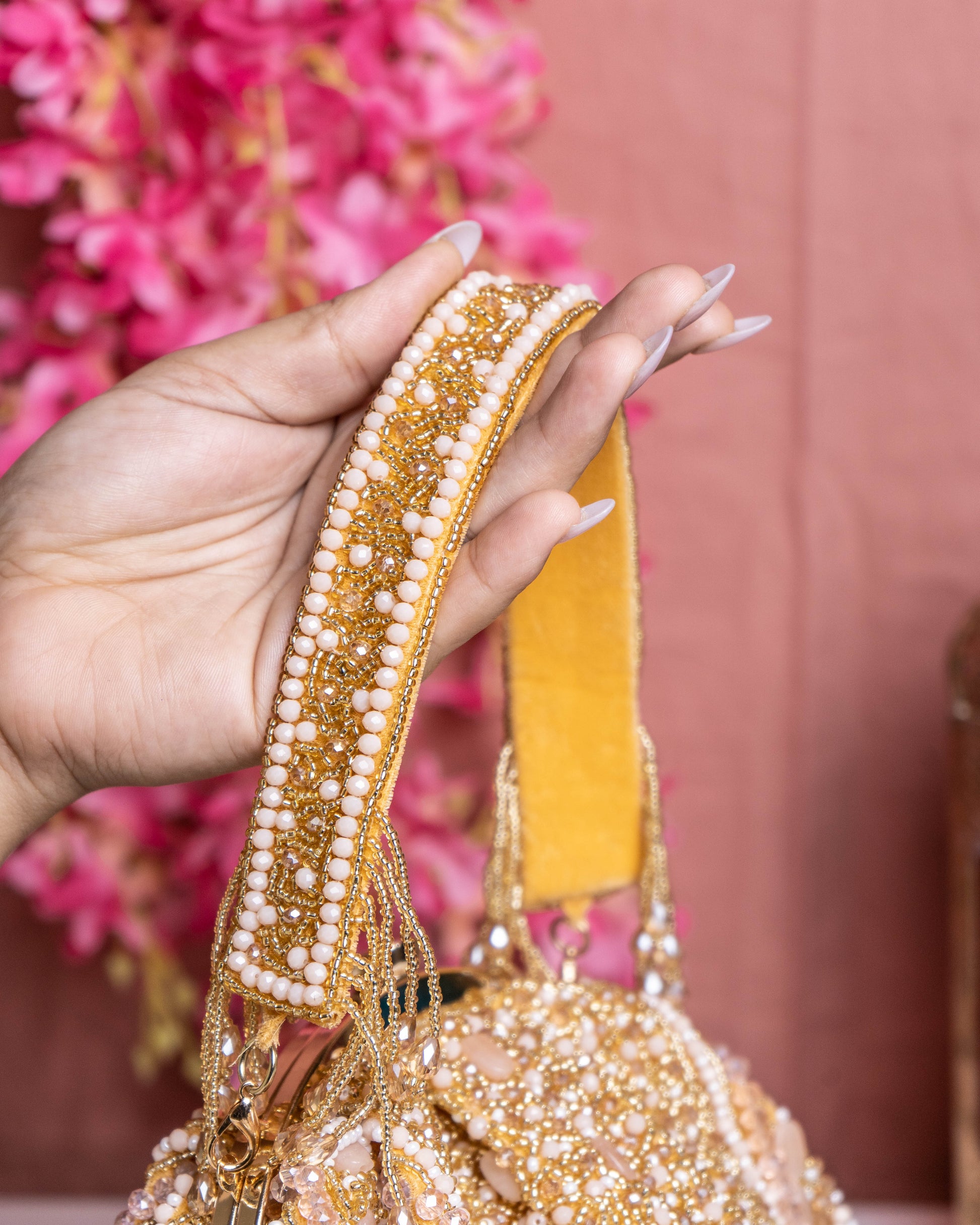 Golden Beaded Handbag with Fringe Detailing