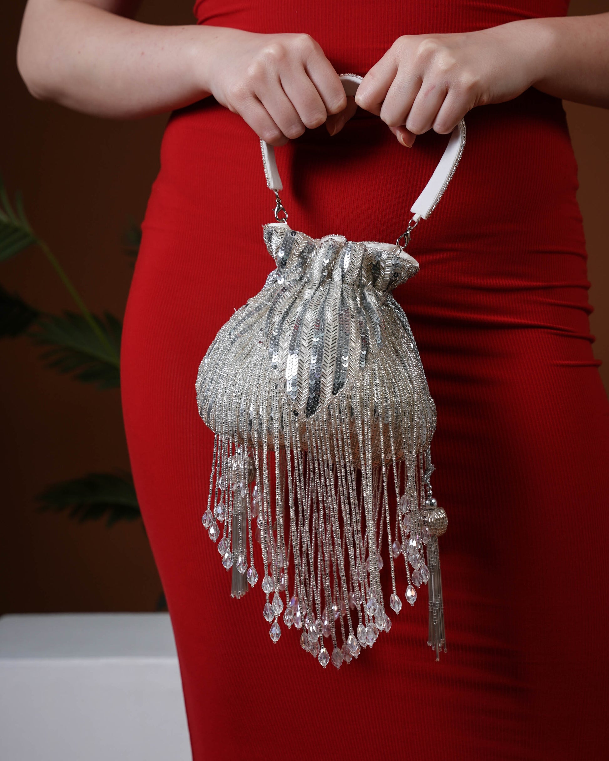 Sitara Silver Fringe Potli – Hand-Beaded Party Bag with Crystal Tassels